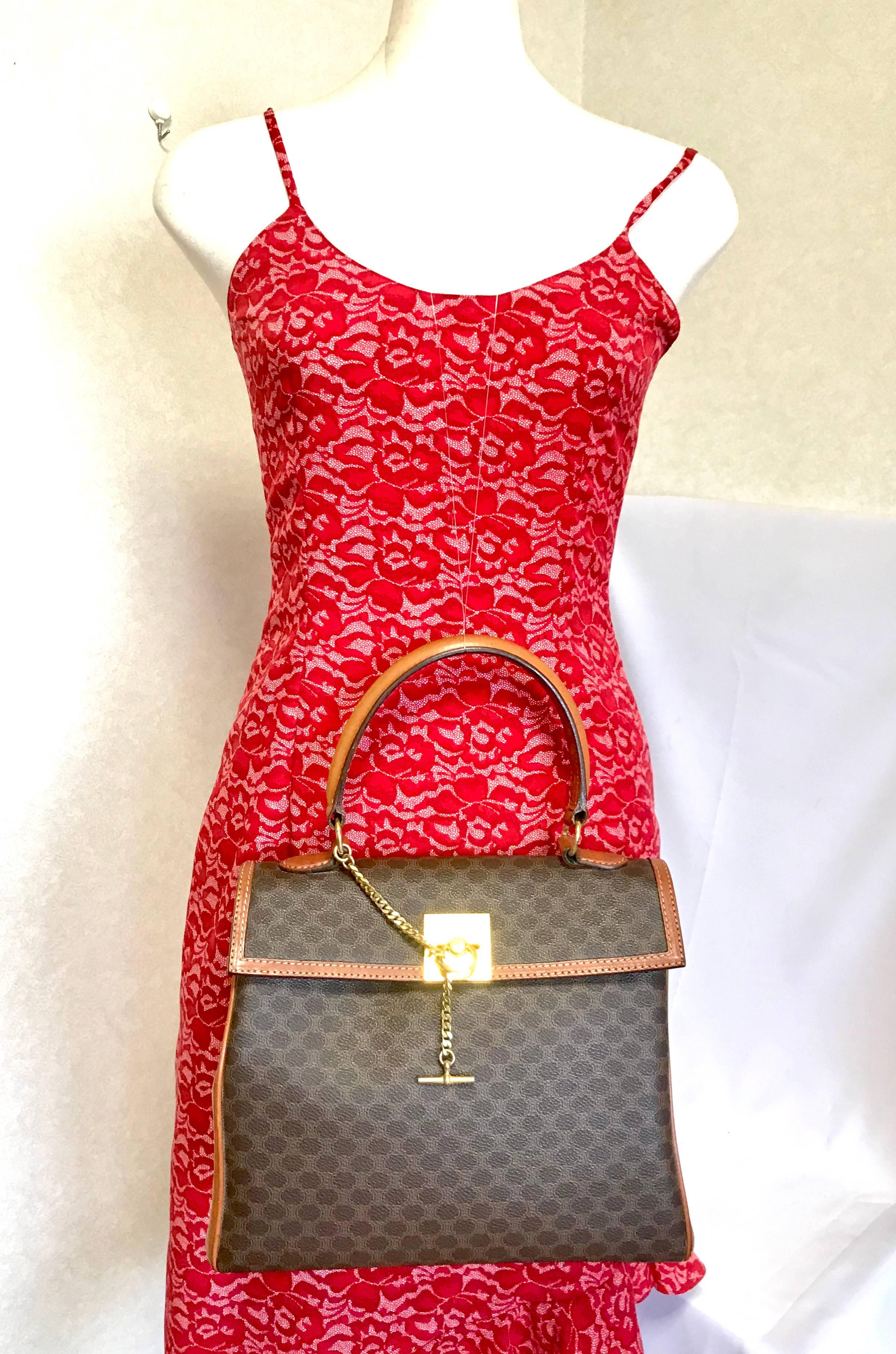 Vintage CELINE brown logo printed Kelly style handbag with golden closure. For Sale 8