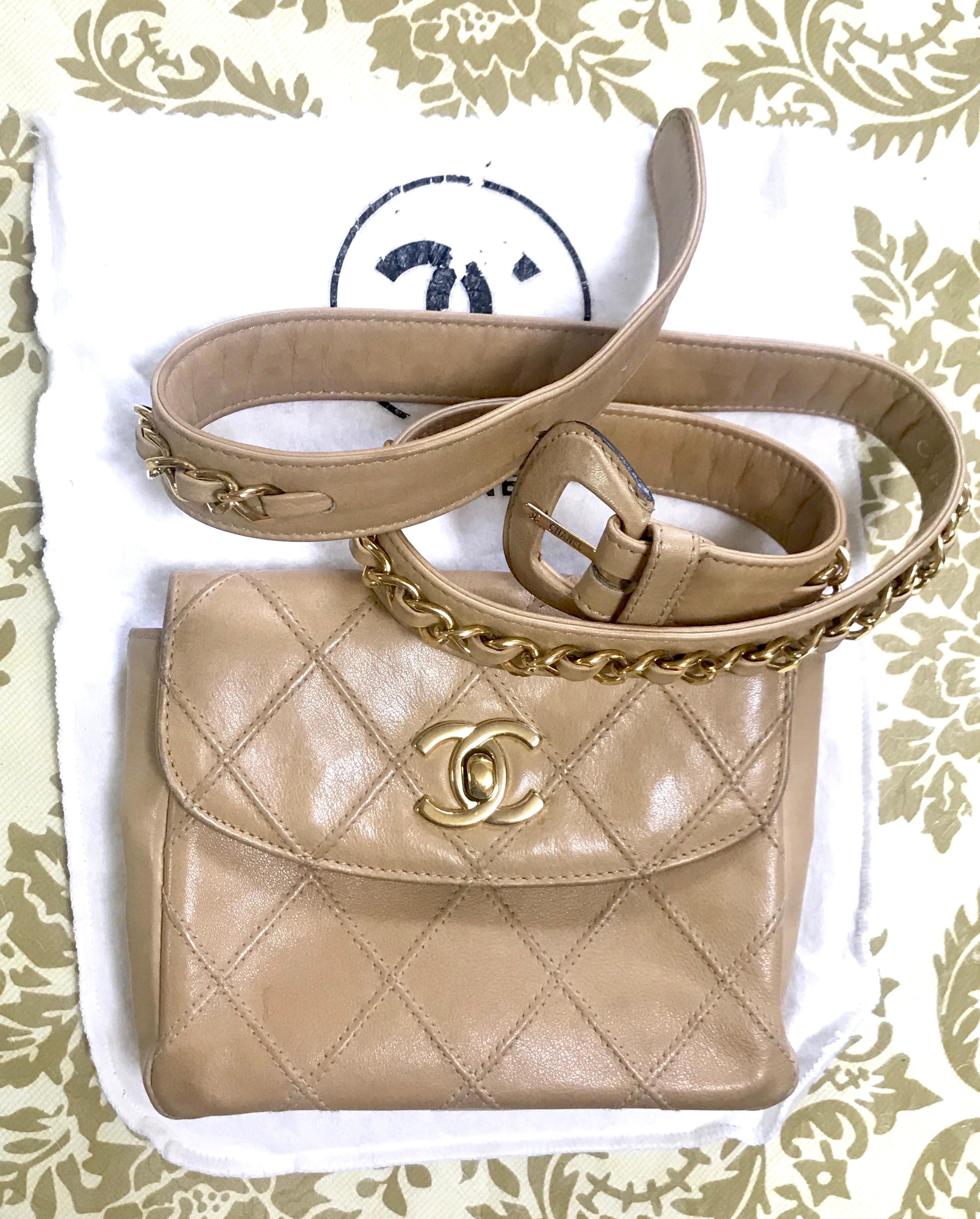 1990s. Vintage CHANEL beige calf leather waist purse, fanny pack, hip bag with gold CC closure and chain belt.  Belt would fit  28.15