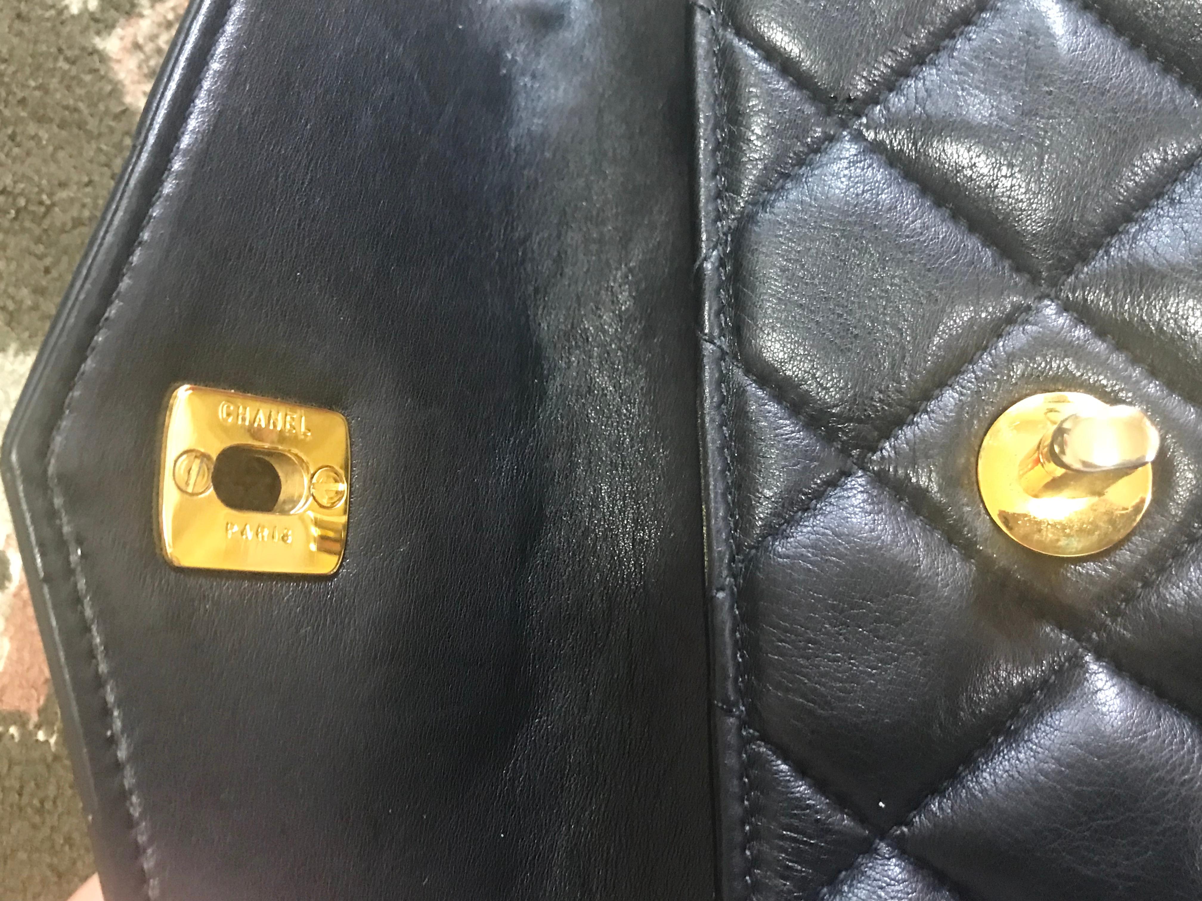 Vintage CHANEL black belt bag, fanny pack with golden chain belt and CC. 28”-30” 7