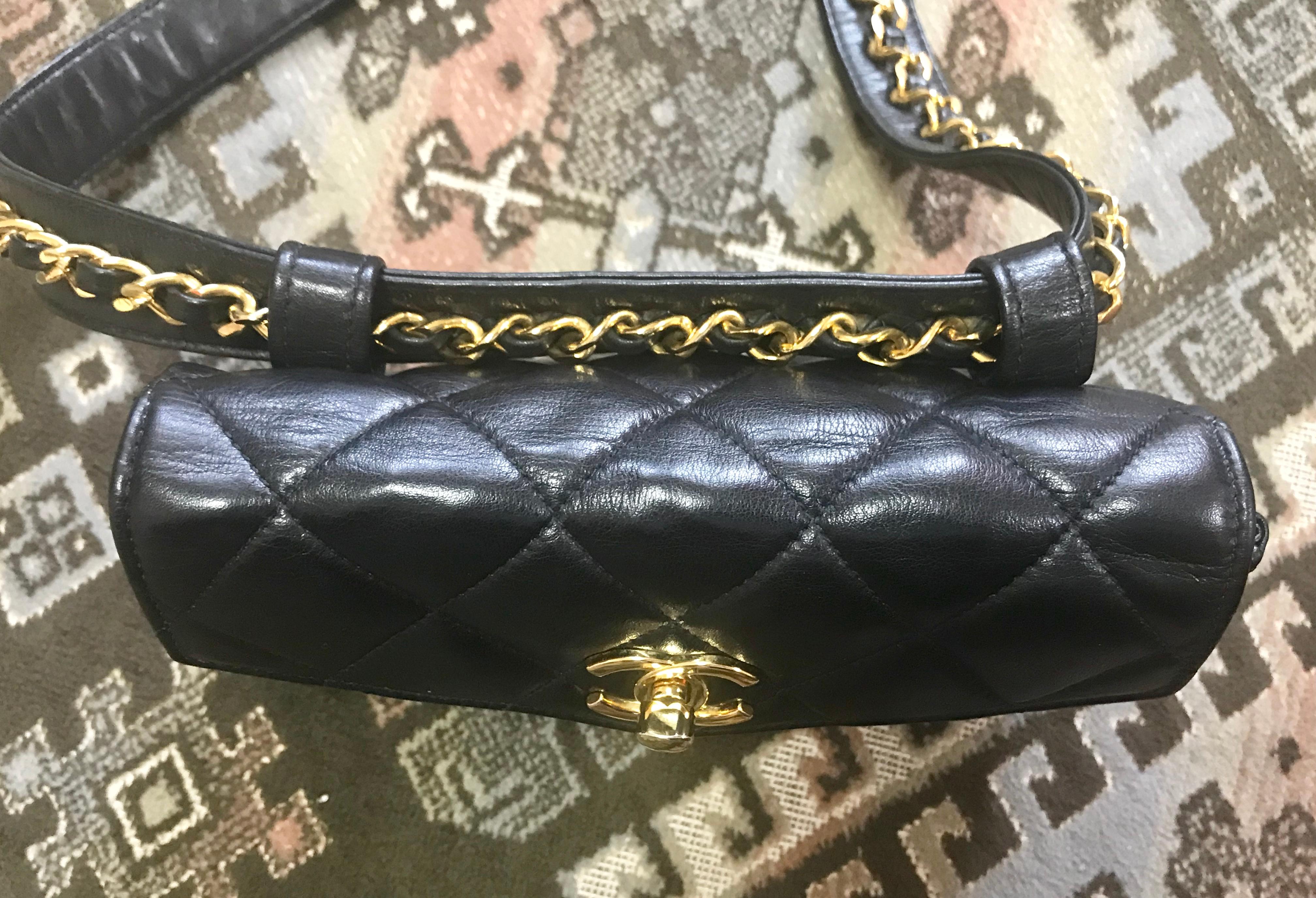 Vintage CHANEL black belt bag, fanny pack with golden chain belt and CC. 28��”-30” 2