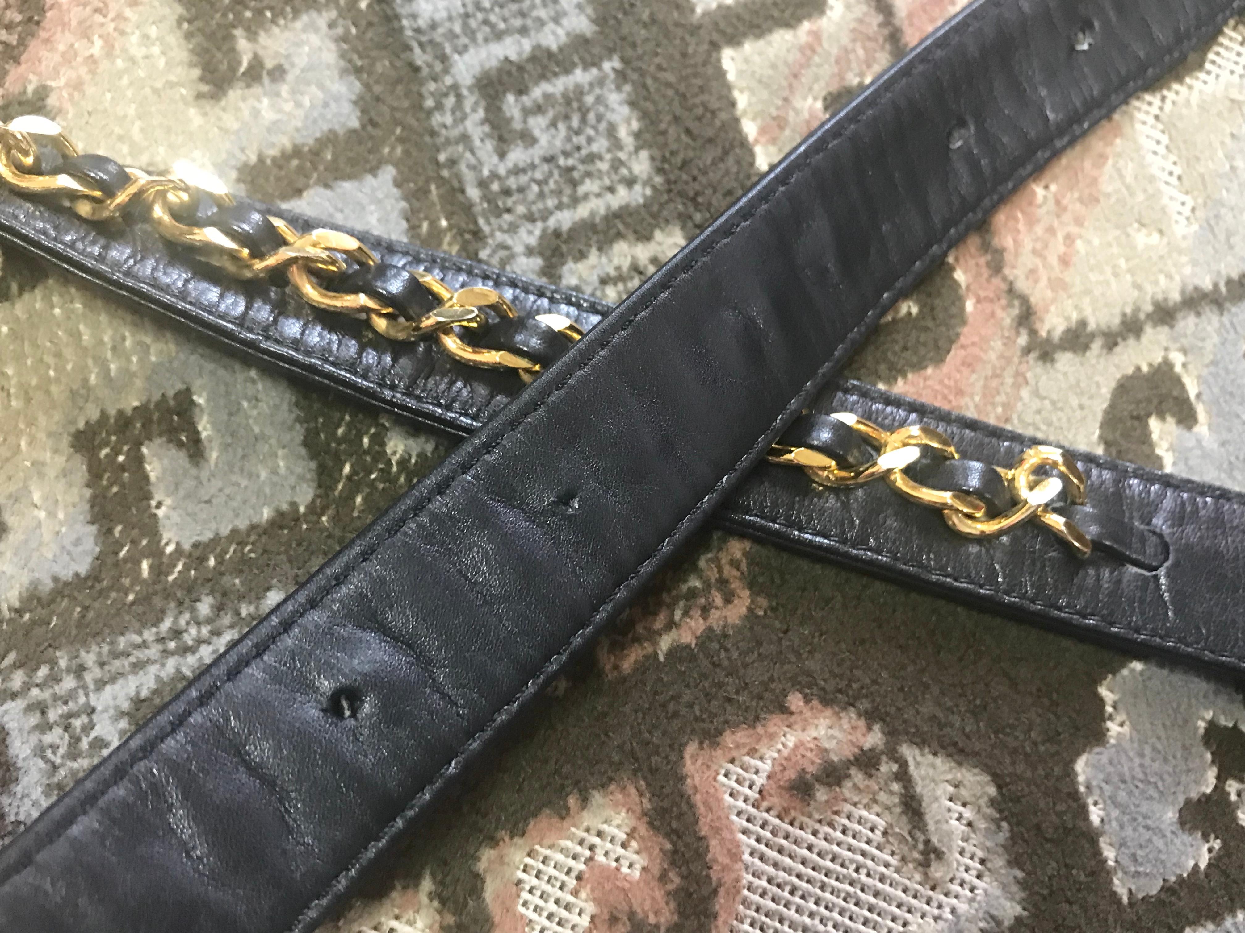 Vintage CHANEL black belt bag, fanny pack with golden chain belt and CC. 28”-30” 14