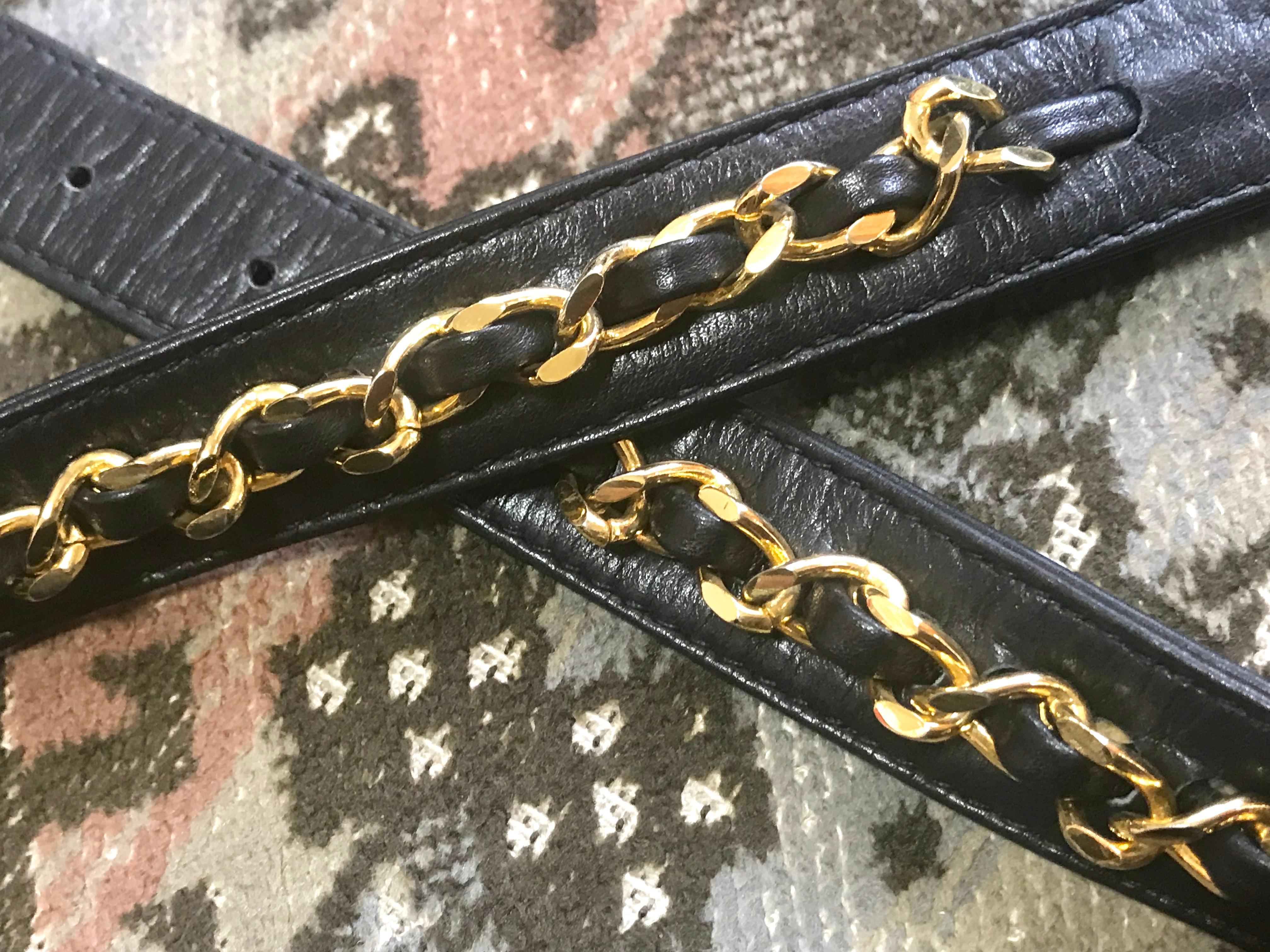 Vintage CHANEL black belt bag, fanny pack with golden chain belt and CC. 28”-30” 15