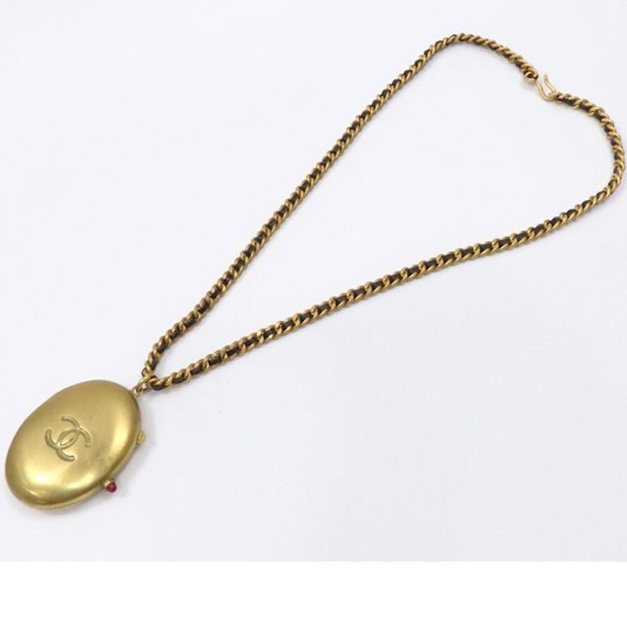 1990s. Vintage CHANEL rare pill case design chain and black leather long necklace with CC mark. Gorgeous masterpiece jewelry.

Introducing another gorgeous Chanel jewelry piece from 1995! 
Unique design like a pill case. If you are a vintage Chanel