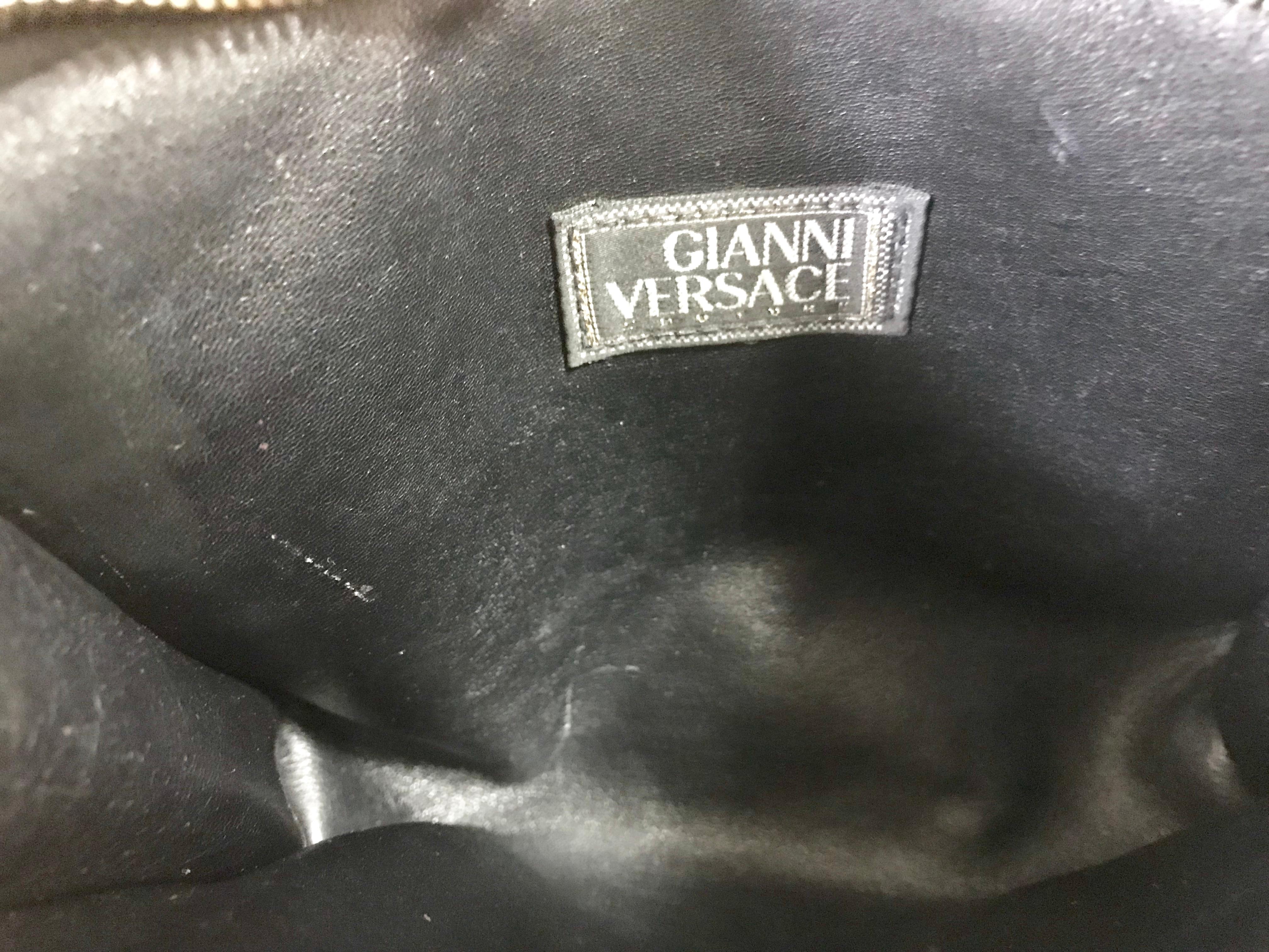 Vintage Gianni Versace black leather clutch purse, pouch, case bag with medusa. 1