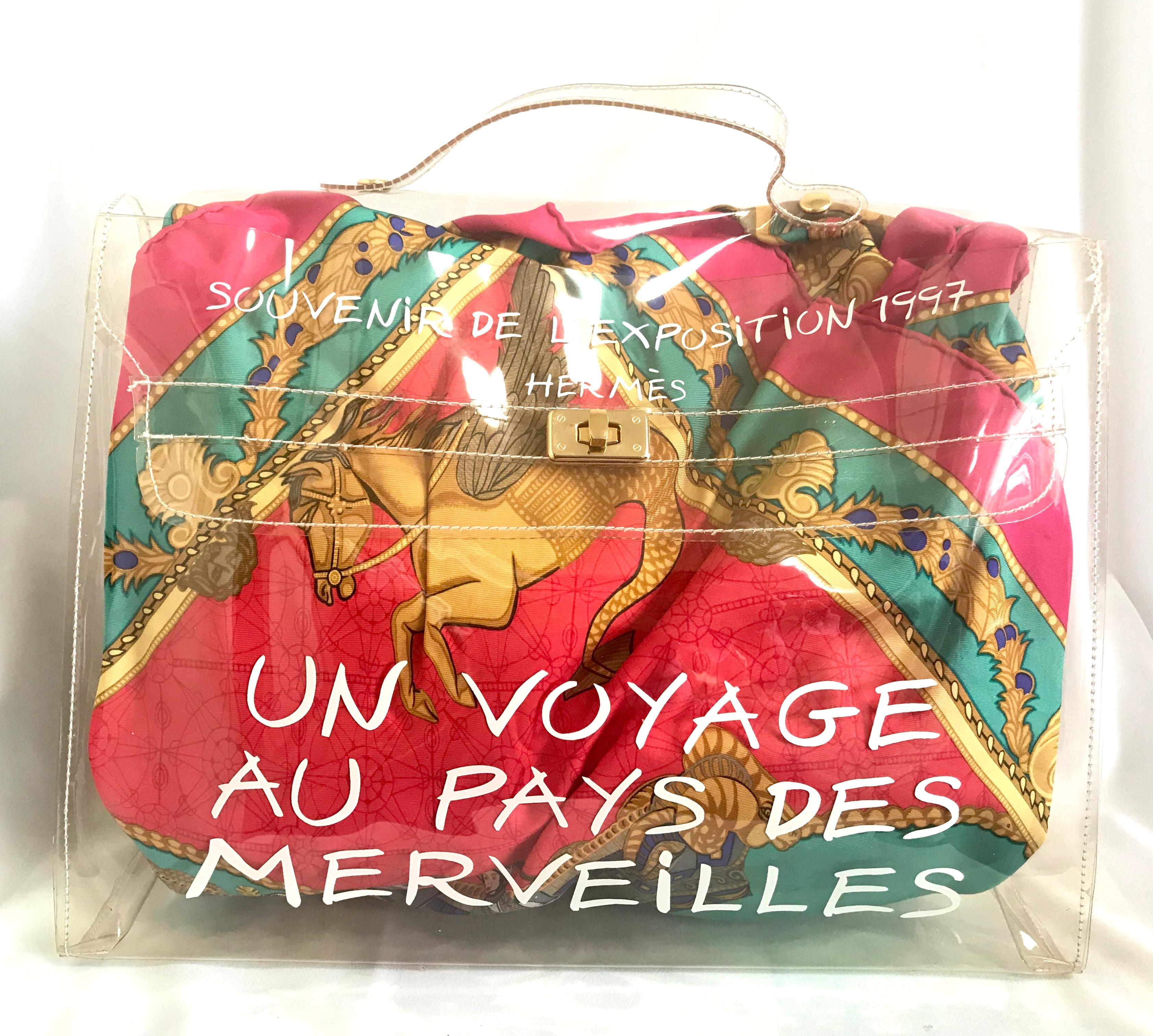 MINT. 1990s. Vintage Hermes rare, clear transparent vinyl Kelly bag/beach bag, Japan limited Edition.  Rare masterpiece.  

*****Please note that the scarf in the bag is for display purpose only. Not for SALE****

This product(The vinyl Kelly bags)
