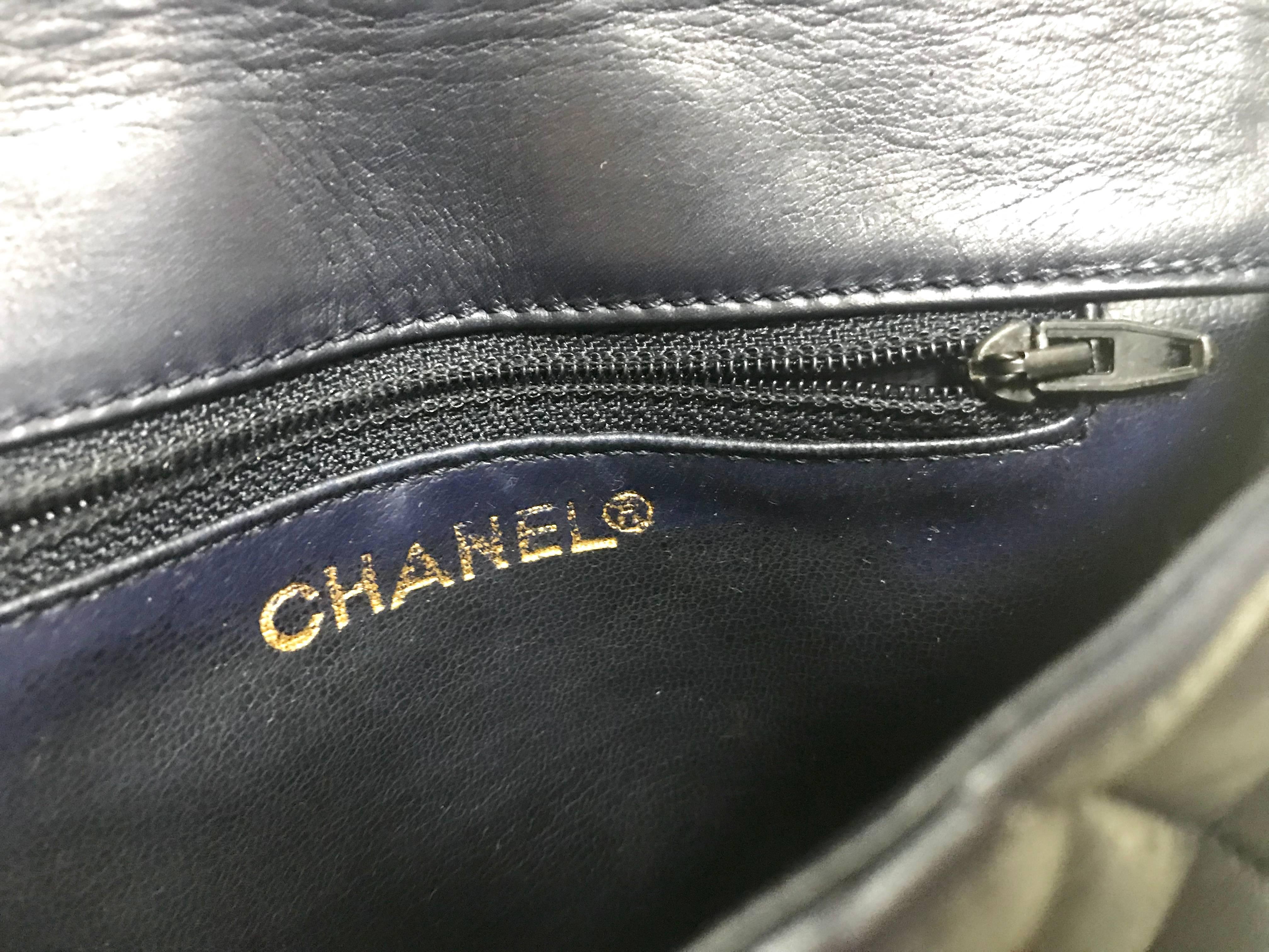 Vintage CHANEL dark navy lamb leather waist bag, fanny pack with golden chains. For Sale 10