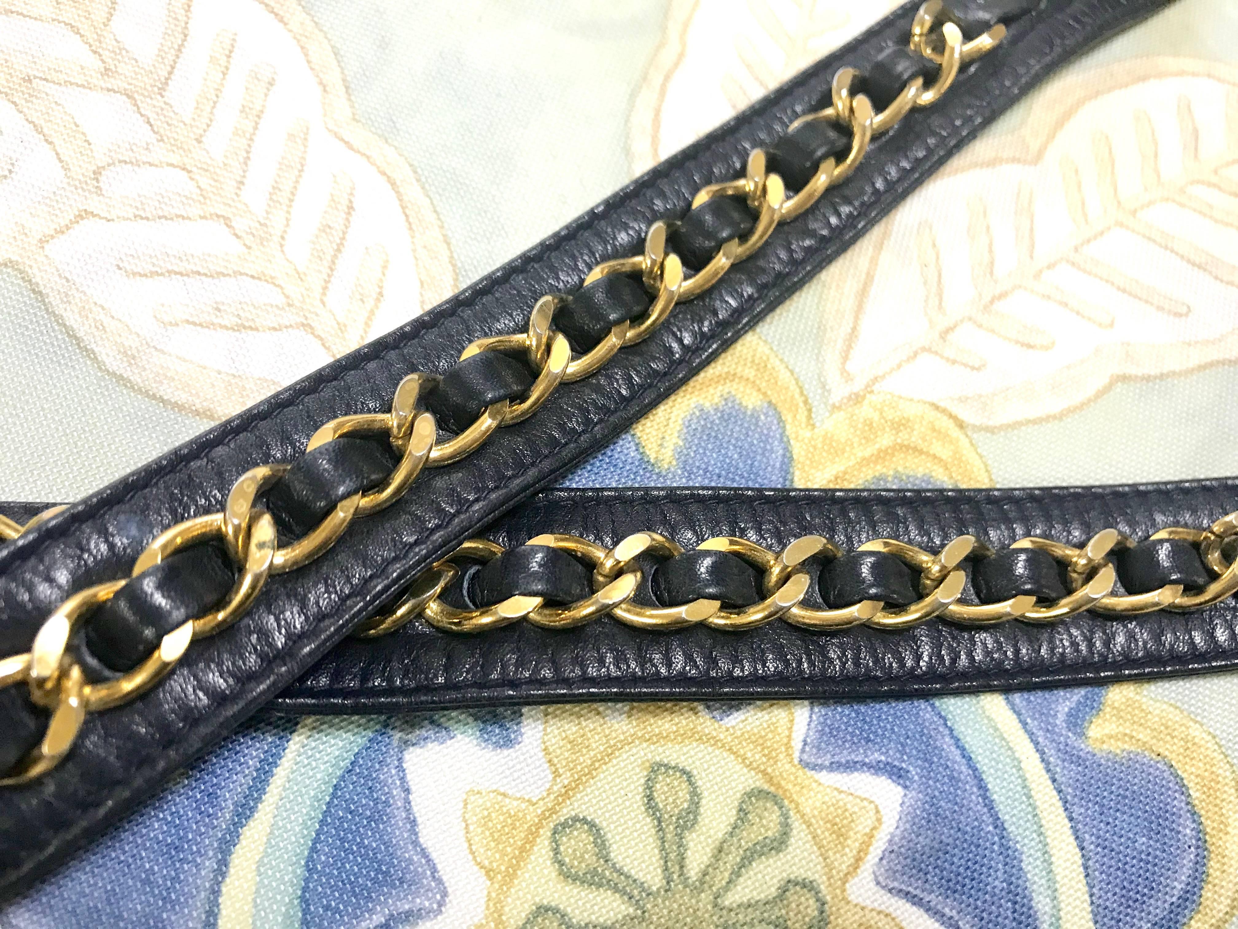Vintage CHANEL dark navy lamb leather waist bag, fanny pack with golden chains. For Sale 15