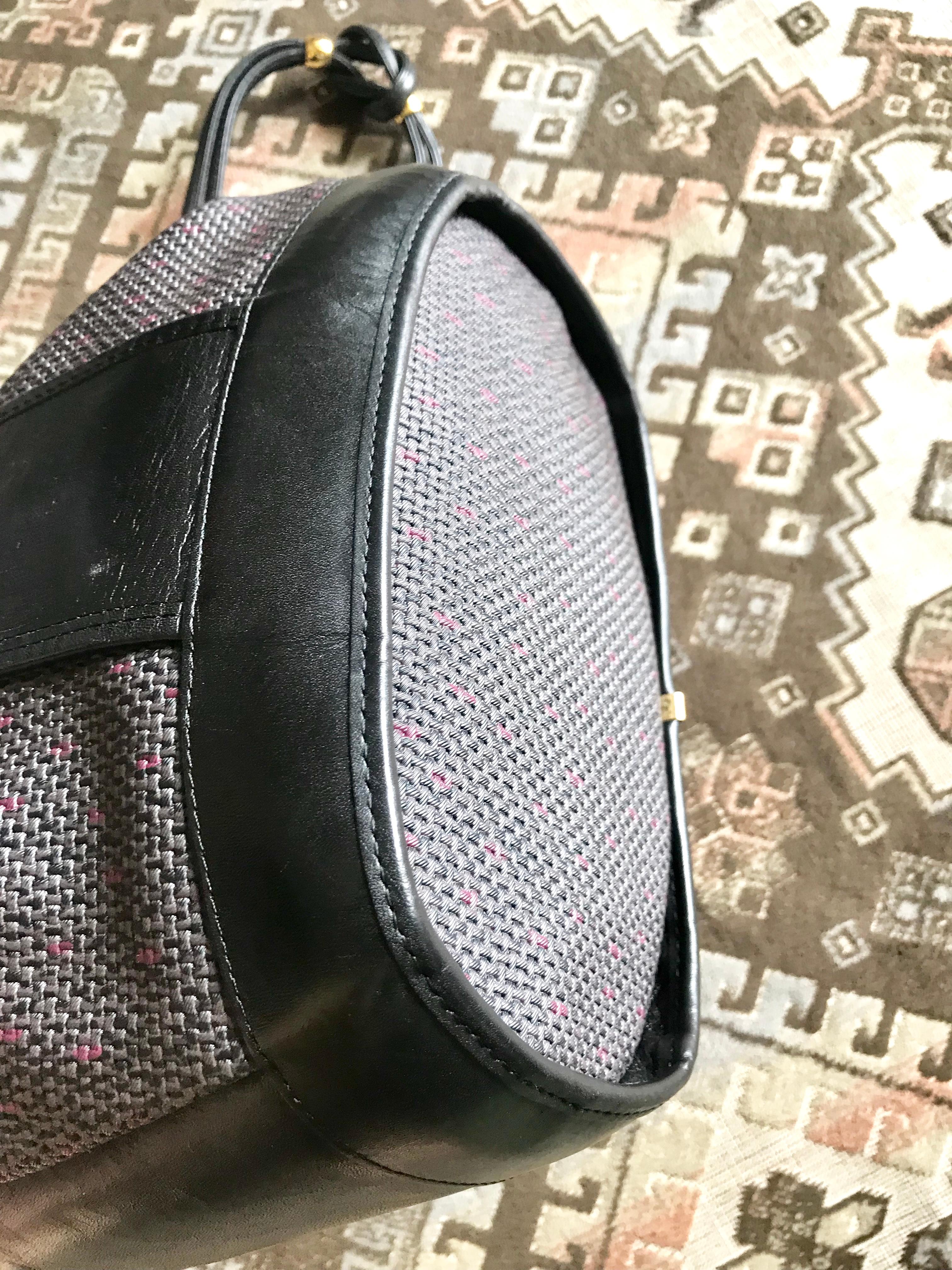 Yves Saint Laurent Vintage black hobo bucket shoulder bag with golden YSL motif For Sale 2