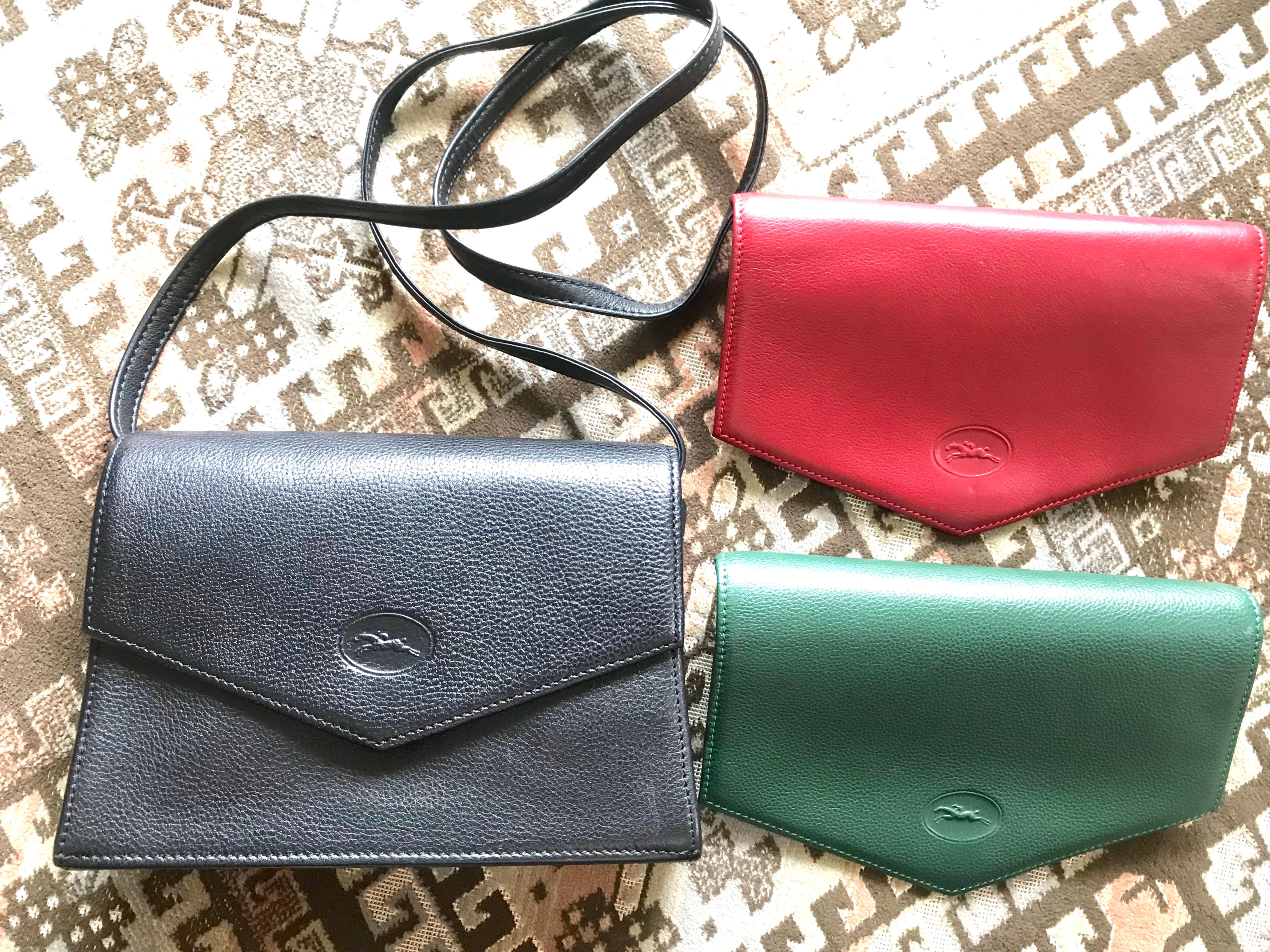 1980s. Vintage Longchamp Shoulder Bag with changeable black, green, red flaps. For unisex use, daily bag.

Introducing classic design shoulder purse but rare style from Longchamp back in the 80s.

The base color is black but you can enjoy 3