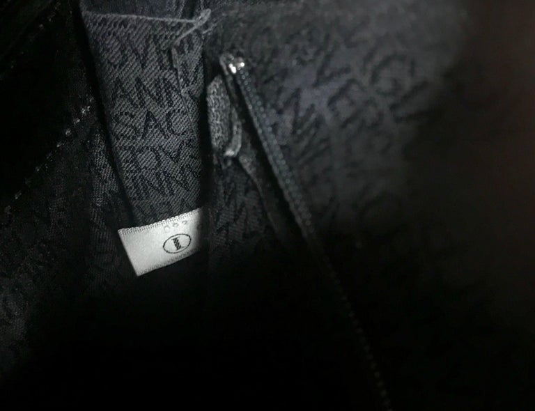 Gianni Versace Vintage black bolide shape bag with a tassel and sunburst motifs  For Sale 12