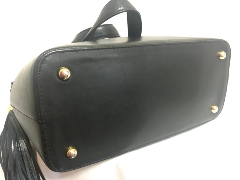 Gianni Versace Vintage black bolide shape bag with a tassel and sunburst motifs  For Sale 8