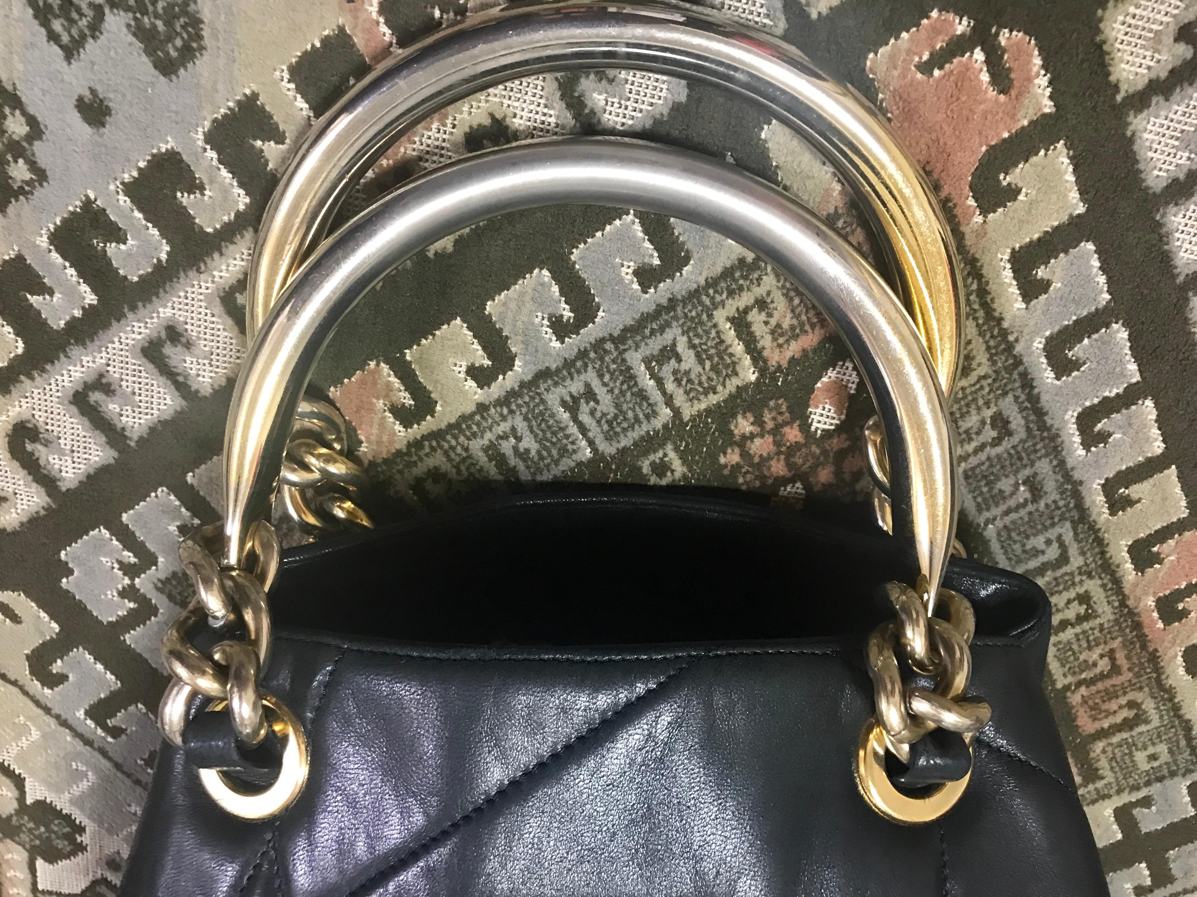 Prada Vintage black leather geometric patchwork tote bag with metallic handles For Sale 12