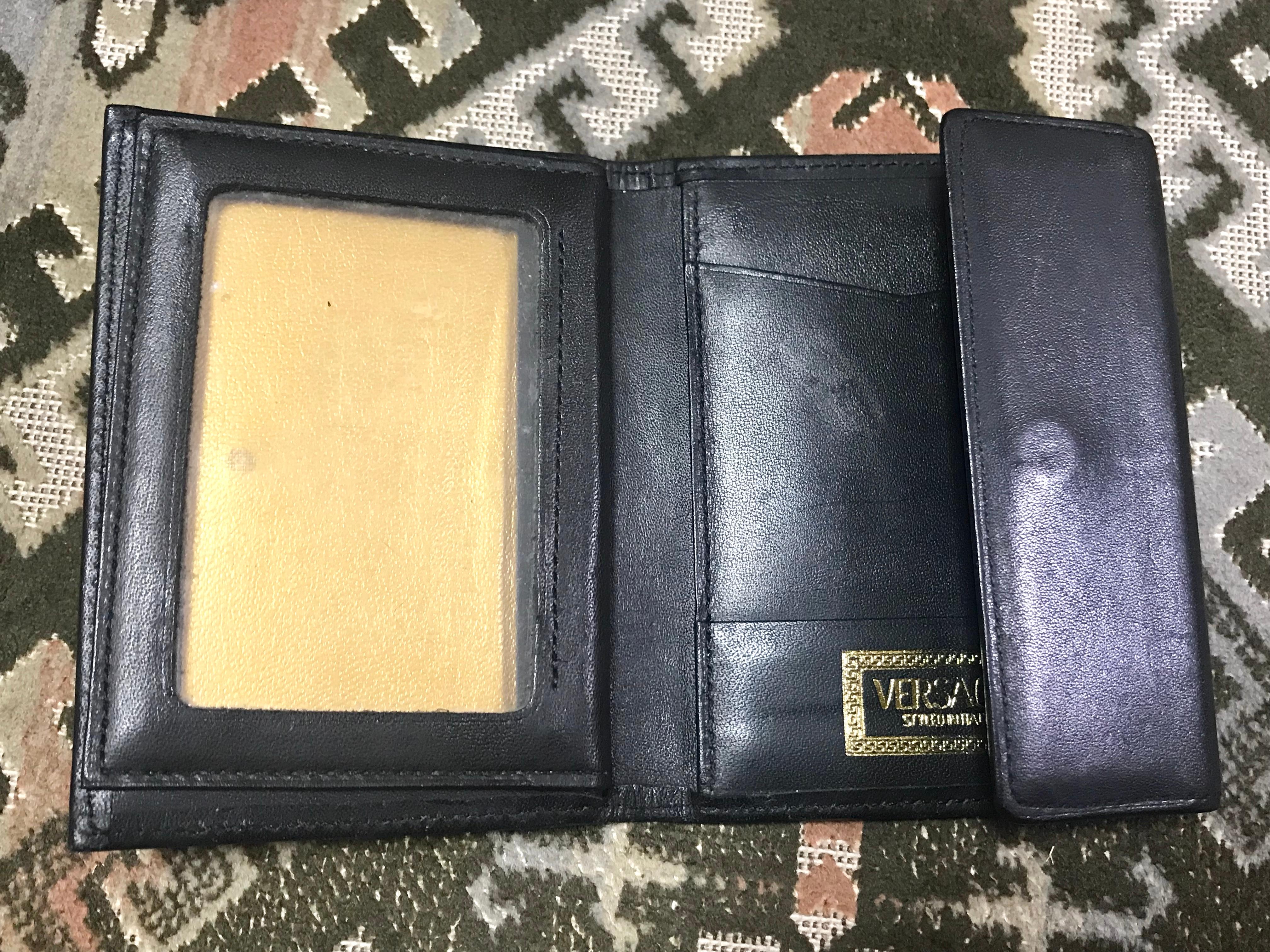 black and yellow wallet