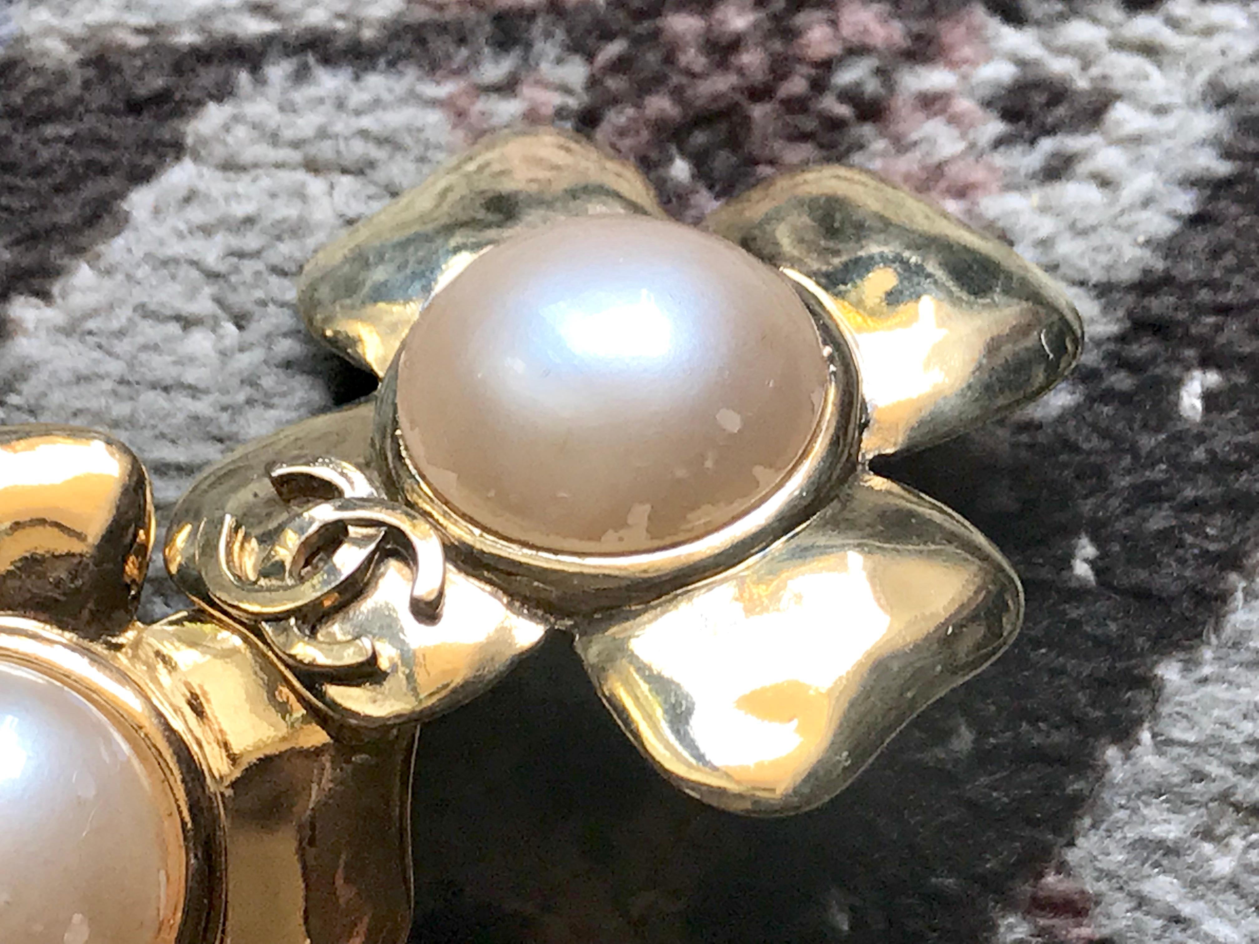 Chanel Vintage large golden camellia flower earrings with faux pearl and CC mark For Sale 6