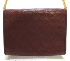 Vintage CHANEL brown 2.55 style mini shoulder bag with CC and skinny chains.