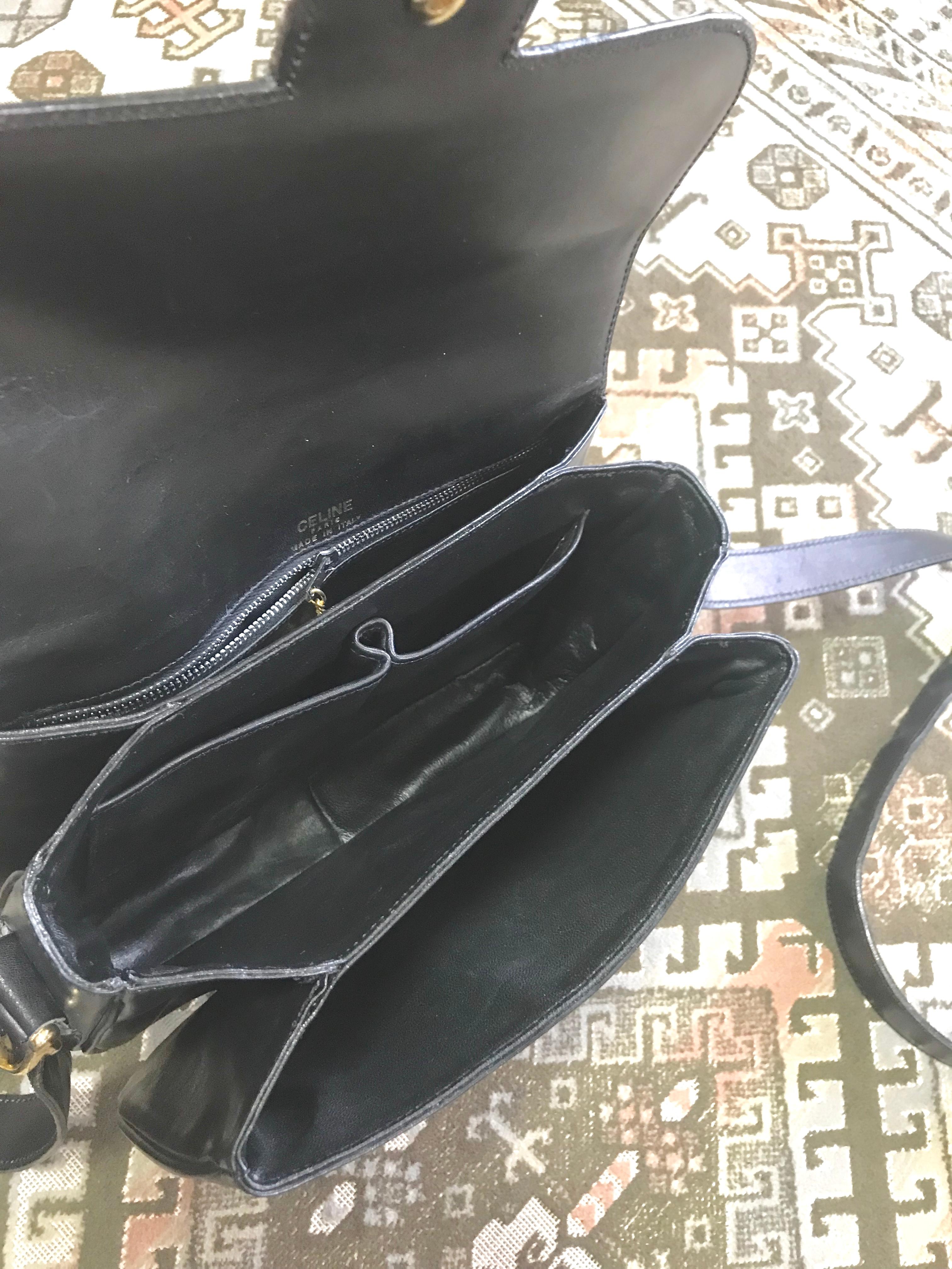 Vintage Celine black leather classic shoulder bag with golden logo closure. For Sale 5