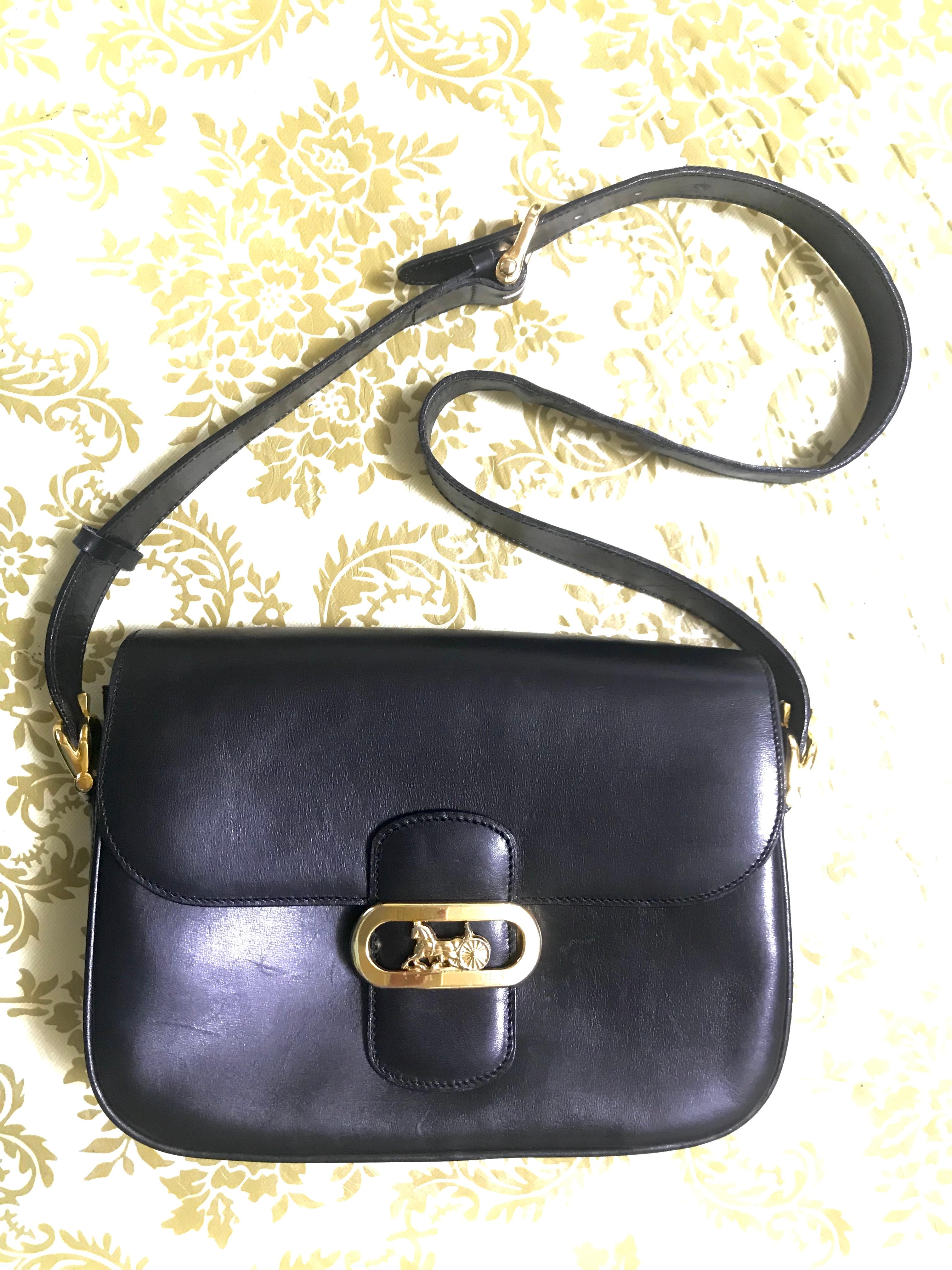 Vintage Celine black leather classic shoulder bag with golden logo closure. For Sale 9