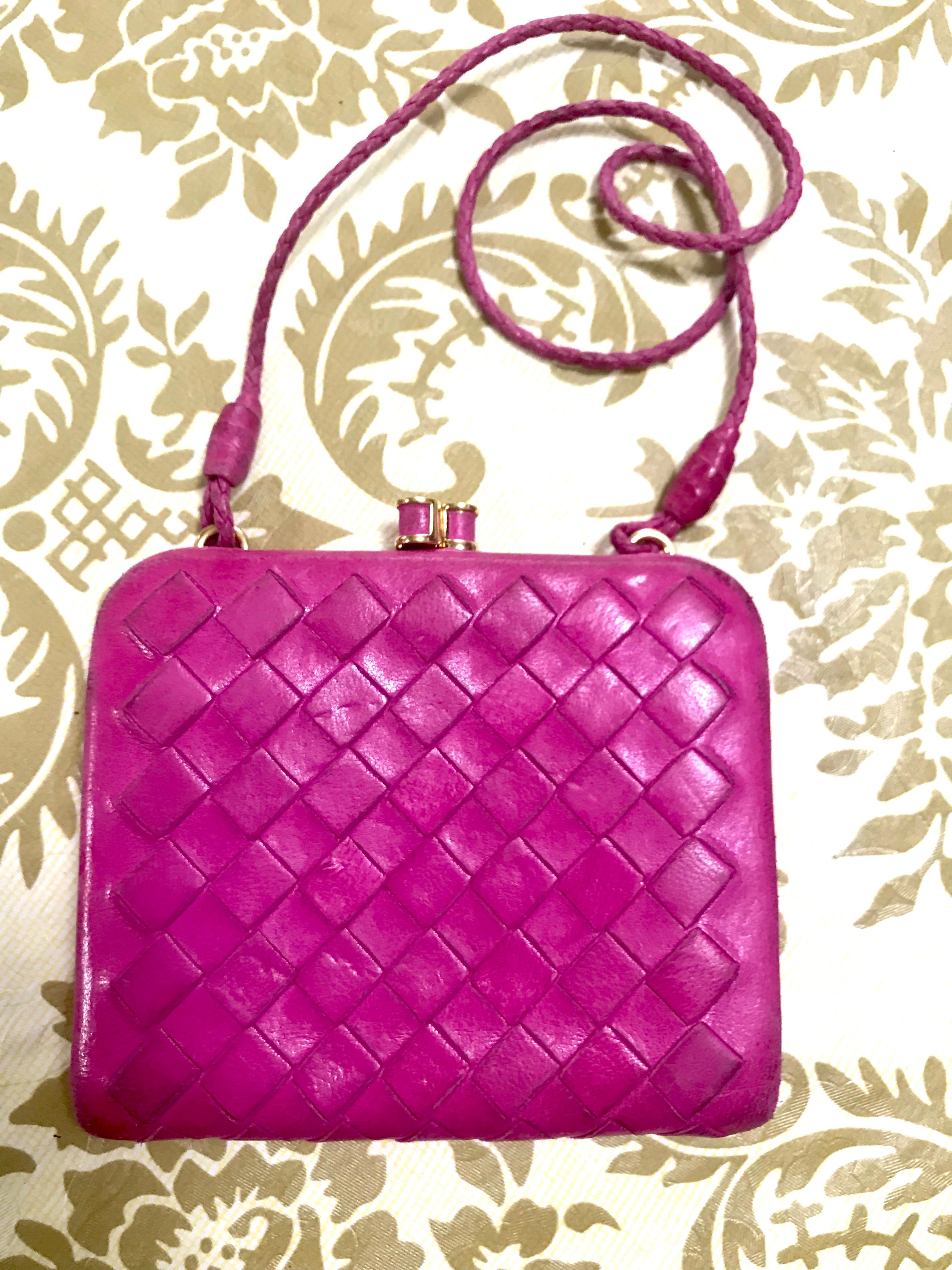 1990s. Vintage Bottega Veneta intrecciato woven leather wallet, coin case, purse in hot pink. Fun and hot gift

Bottega Veneta's iconic style  intrecciato coin wallet purse in hot pink! 
You can easily grab it with the strap in your bag or to