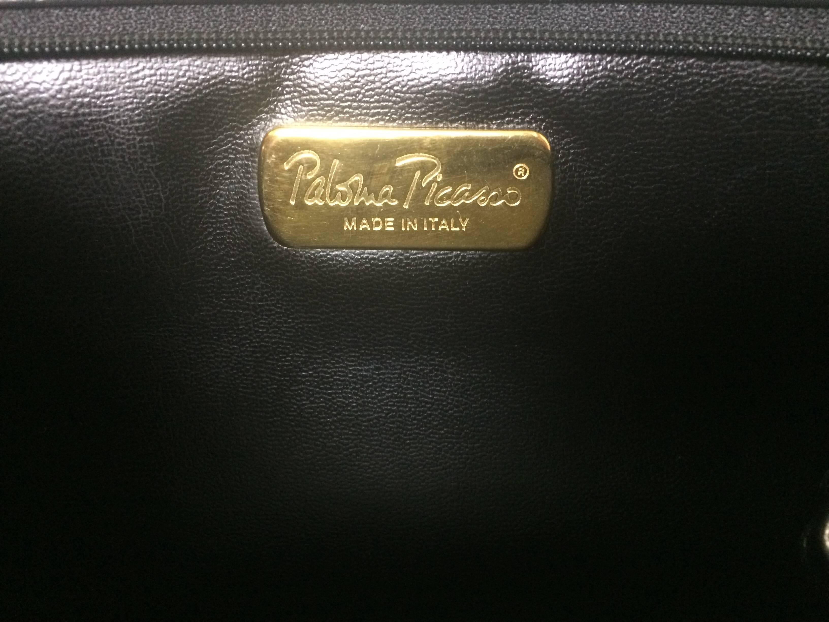 Vintage Paloma Picasso black shoulder bag with gold letter prints. For Sale 4