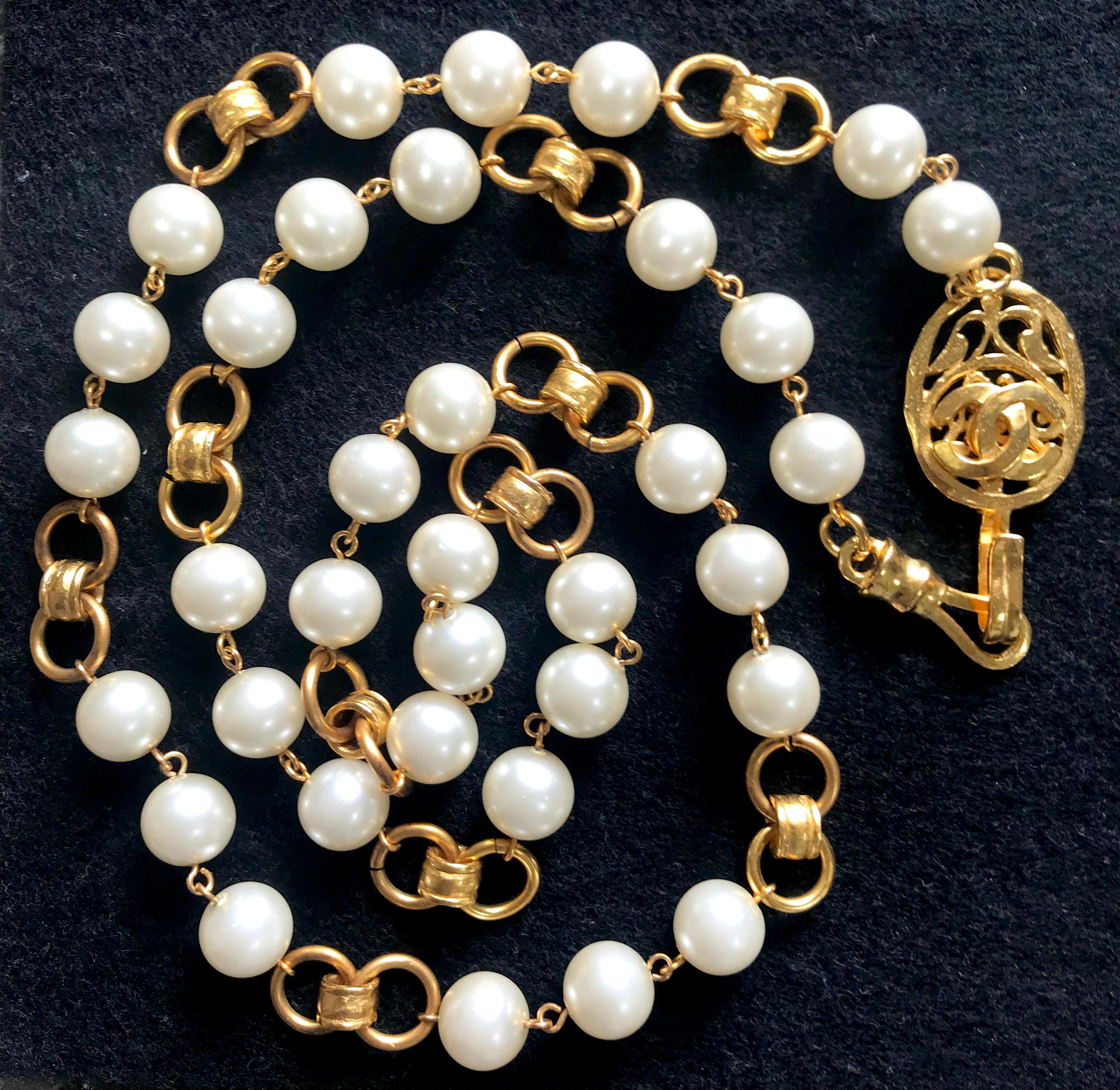 Vintage Chanel golden long chain and faux pearl necklace, belt with CC mark.  For Sale 1
