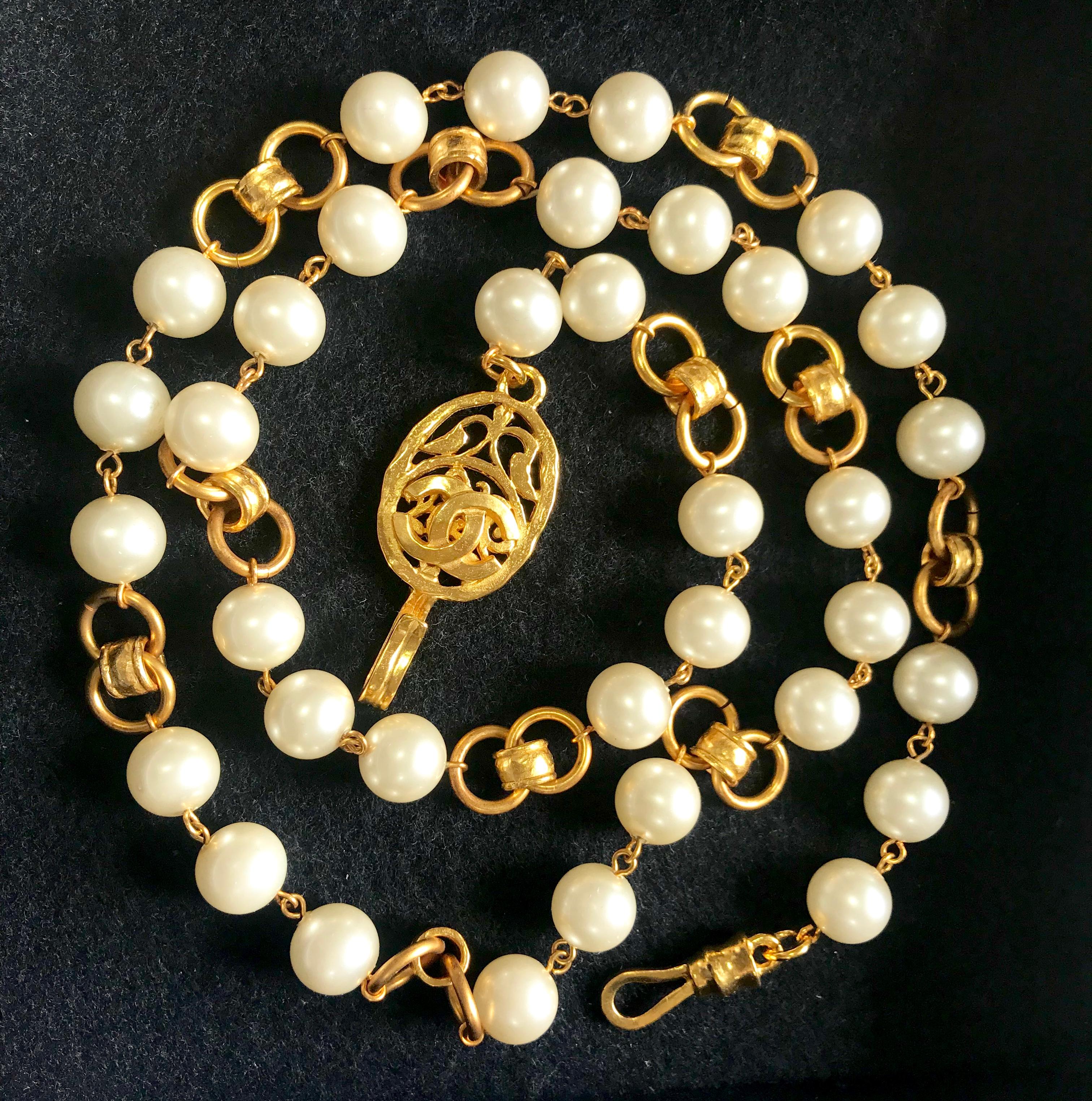 Vintage Chanel golden long chain and faux pearl necklace, belt with CC mark.  For Sale 14