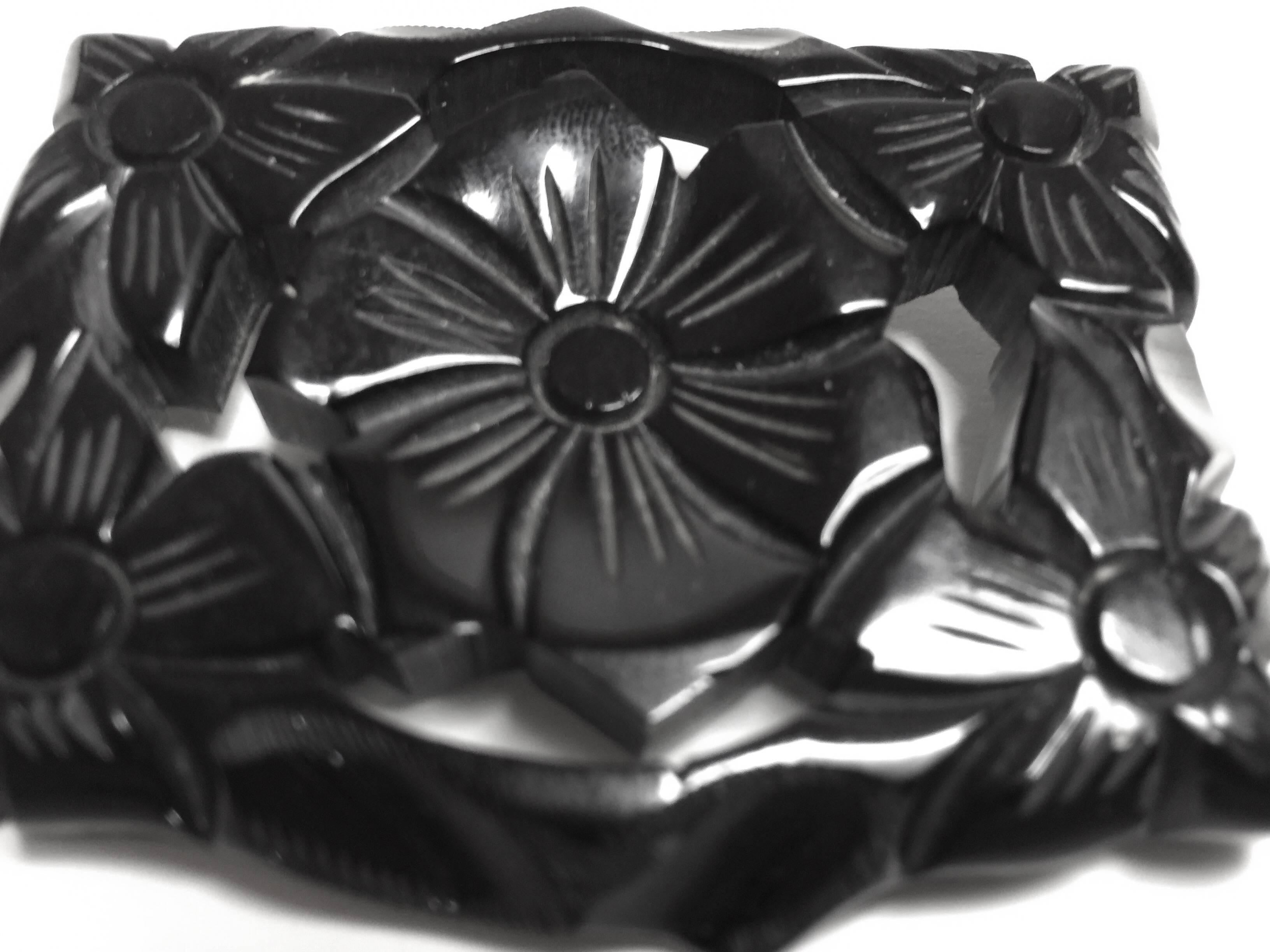 A miniature work of art, this jet black wheel carved by hand rectangular floral bakelite brooch harkens back to the mourning jewelry stylings of the Victorian Era, Sometimes early 20th century items look backwards a bit for their design inspiration,