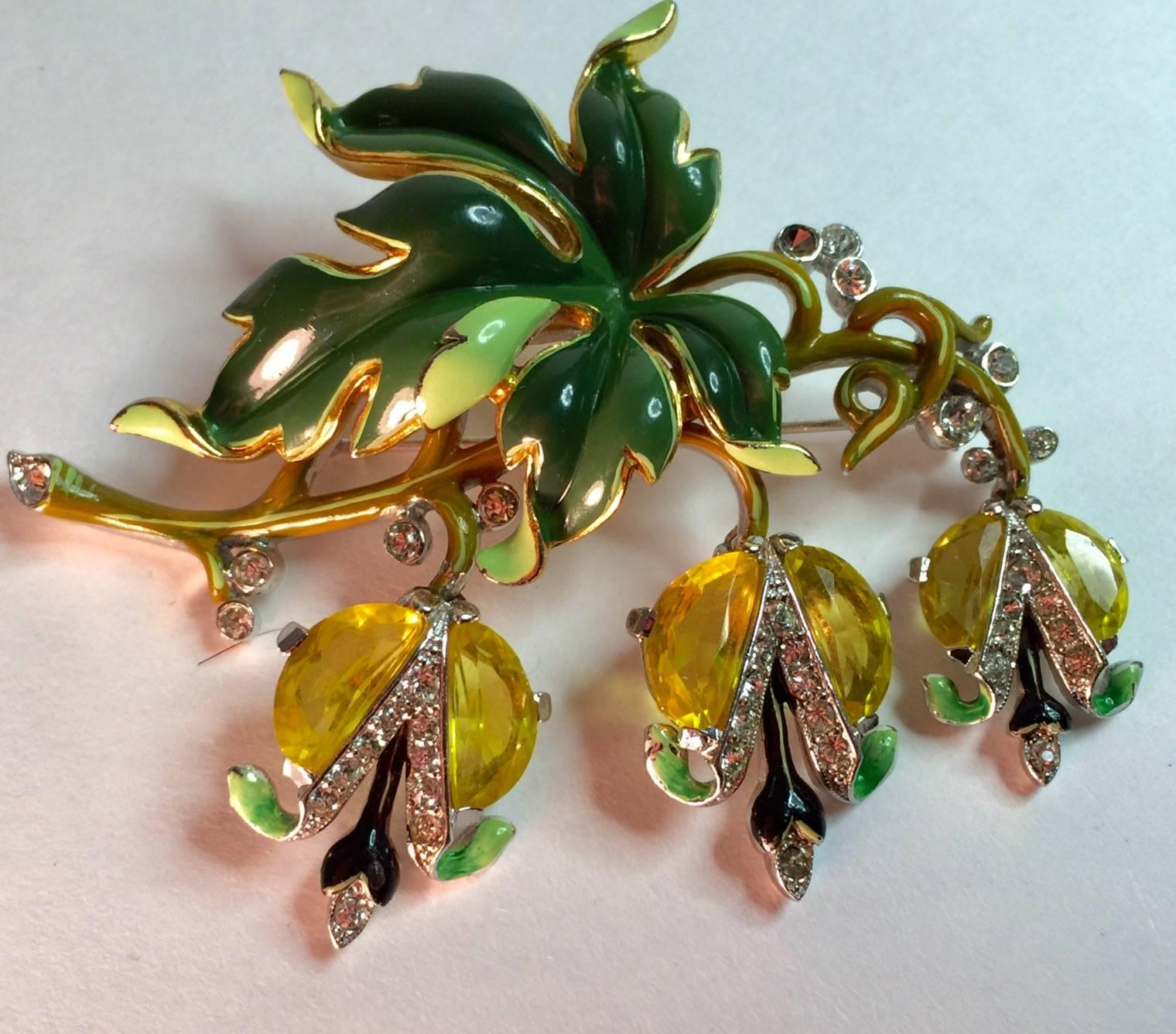 An amazing 1940s Rare and IMPORANT  TRIFARI Demilune Parure Enameled Bracelet  with coordinate Drop Pin and matching Clip Earrings suite offered here as a group, as the rarity of this suite demands the items stay together as an investment museum