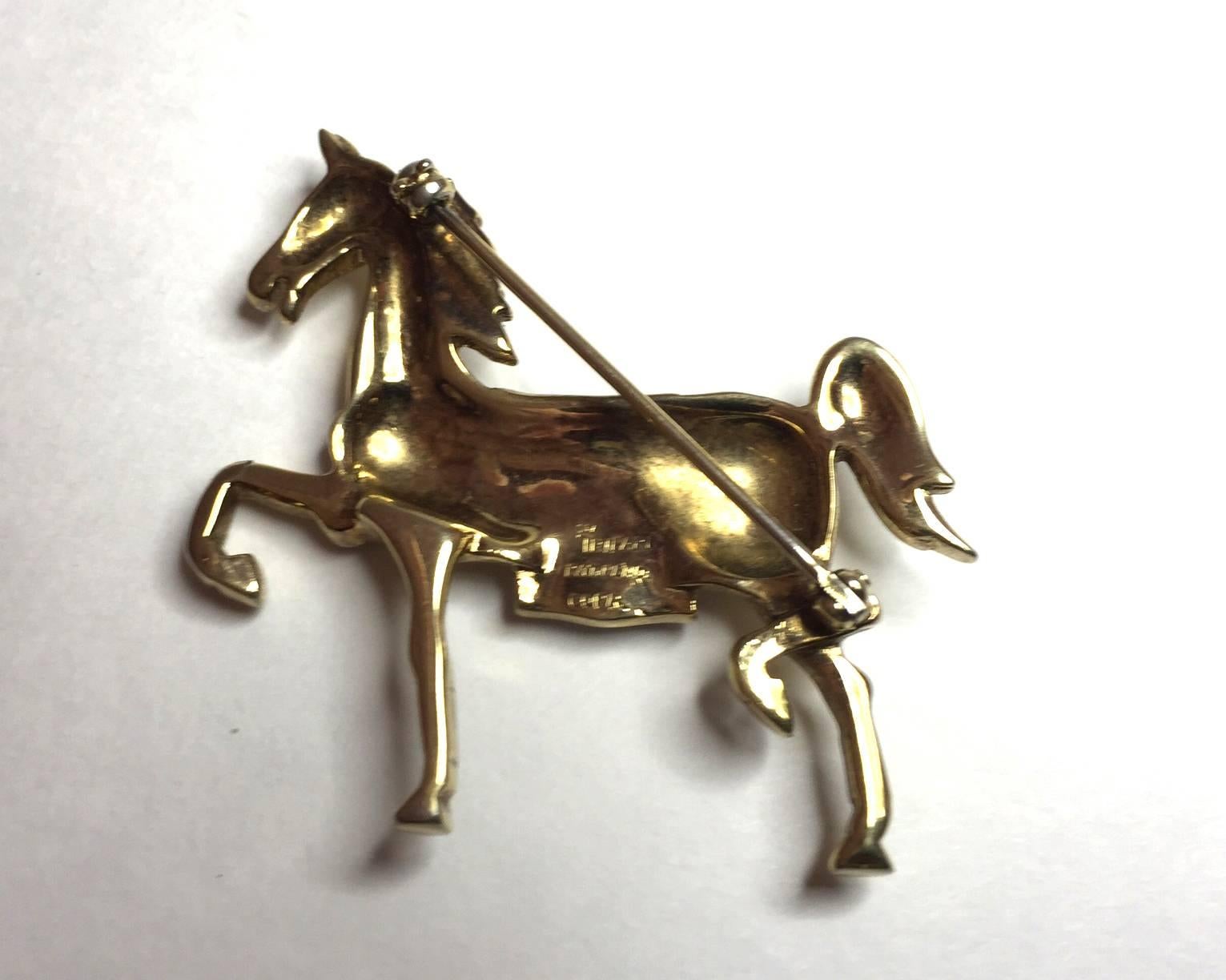 This gorgeous 1940s TRIFARI Faux Sapphire Diamond Retro Horse Stallion Pin  or Brooch measures approximately 2