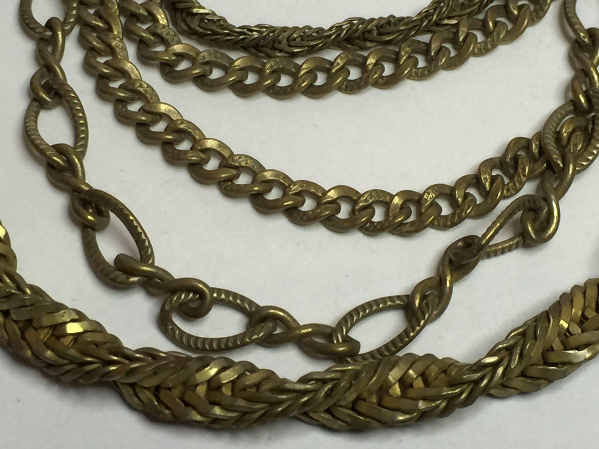 Although known for her intricate wired seed pearl and glass constructed items, Haskell also loved goldtone metal and chain. This multi chain necklace is highly textural in nature, and would twist beautifully with a string of Haskell pearls for a