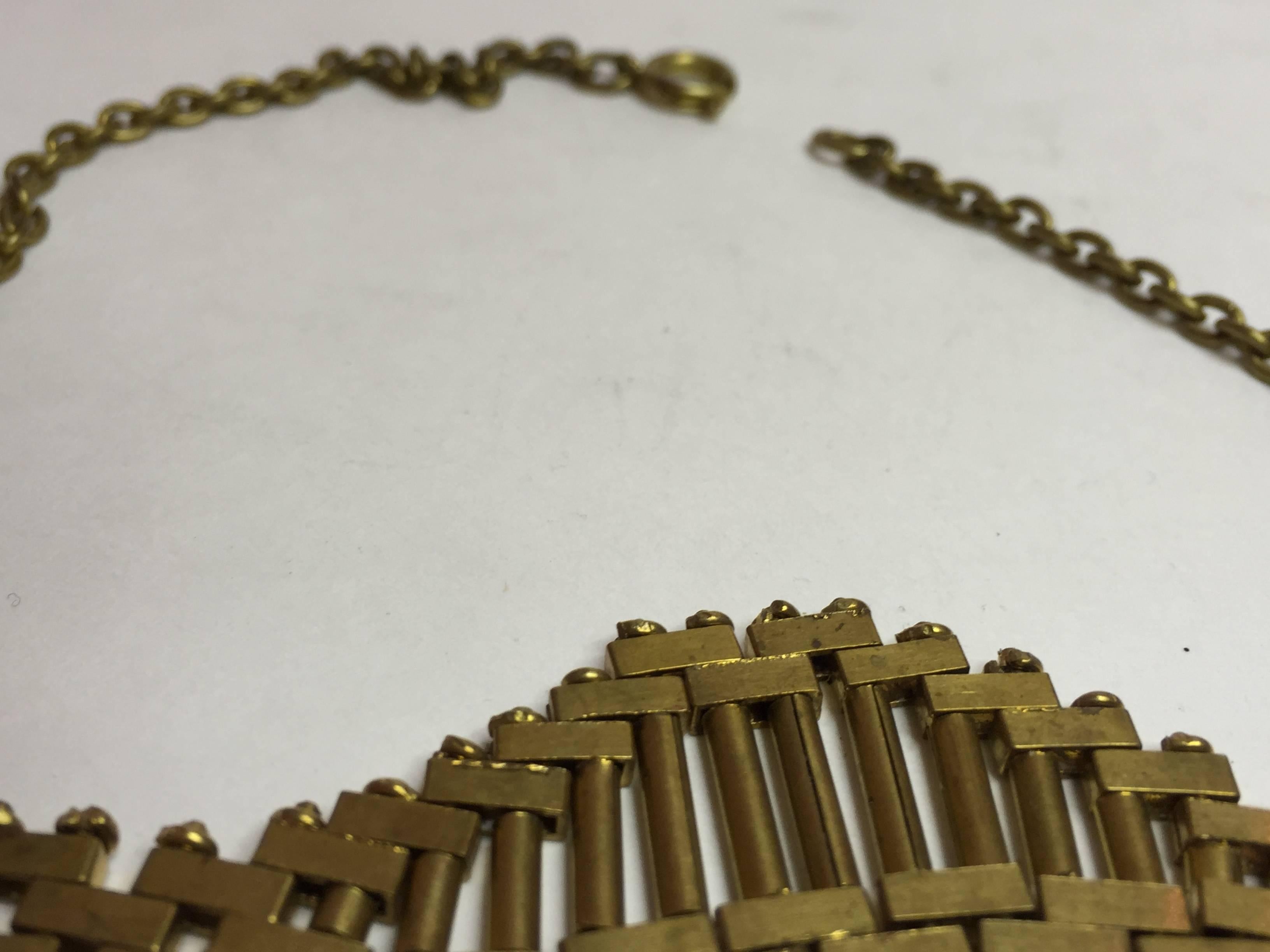 This German Art deco goldtone metal 1930s machine age necklace by Jacob Bengel is archetypal chainwork he is well known for. The central machine age articulated section is 4