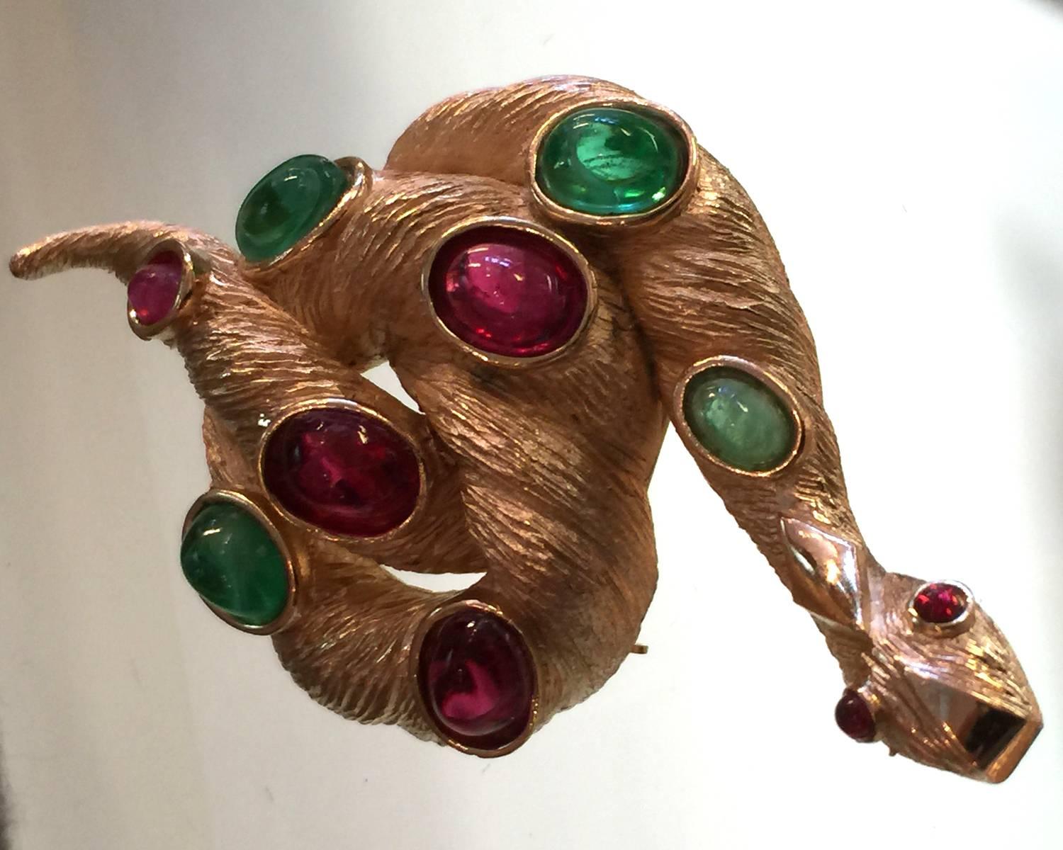 This listing is ONLY for the 1960s TRIFARI Brushed goldtone coiled snake brooch pin embellished with scored detail and gem tone faux ruby and emerald cabochon stonework. The figural detail of the piece is lovely, as seen in the close up of the