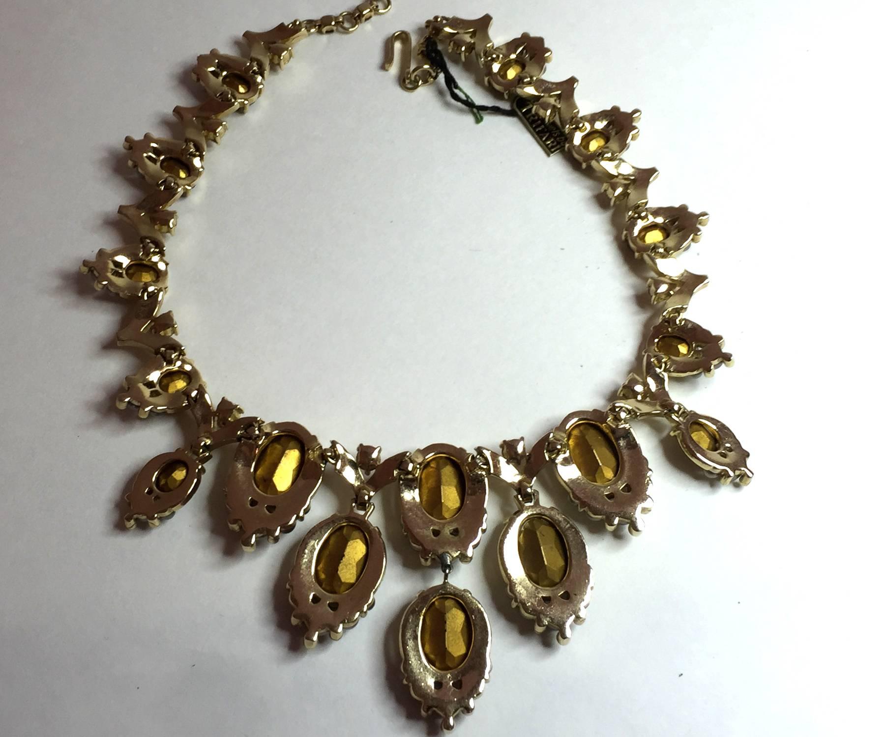 This lovely and glamorous late 1950s TRIFARI Brushed Matte Goldtone Faux Topaz & Smoke Pearl Necklace has that wonderful Victorian revival style so popular in the late 1940's and 1950's, Faux Topaz drops are suspended from a lovely graduated