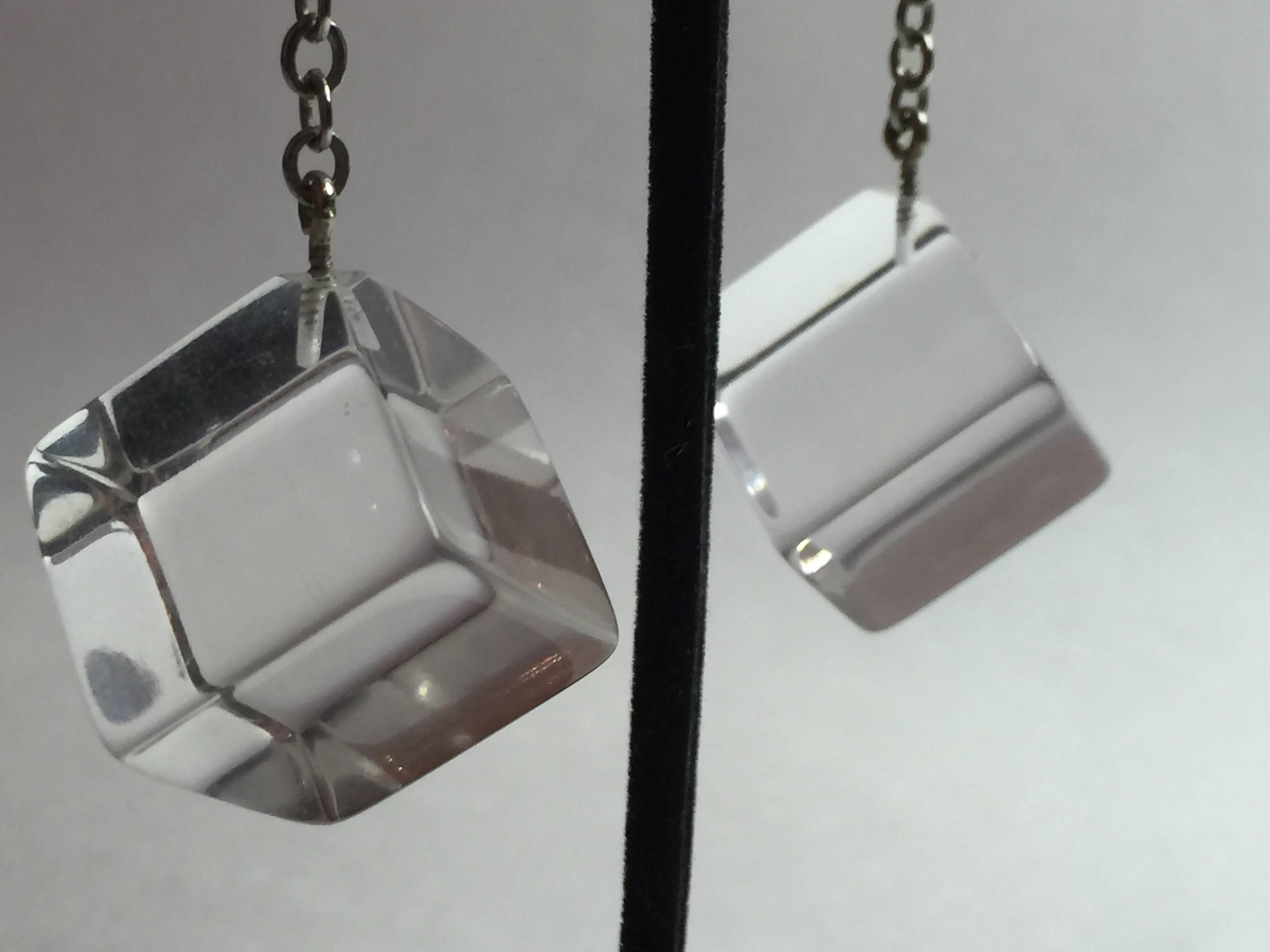 These lovely simple drop earrings by JUDITH HENDLER date from the 21st century. Silvertone balls with silvertone chain suspend tilited full volumetric cubes on the bias.  Total earring length almost 2.75