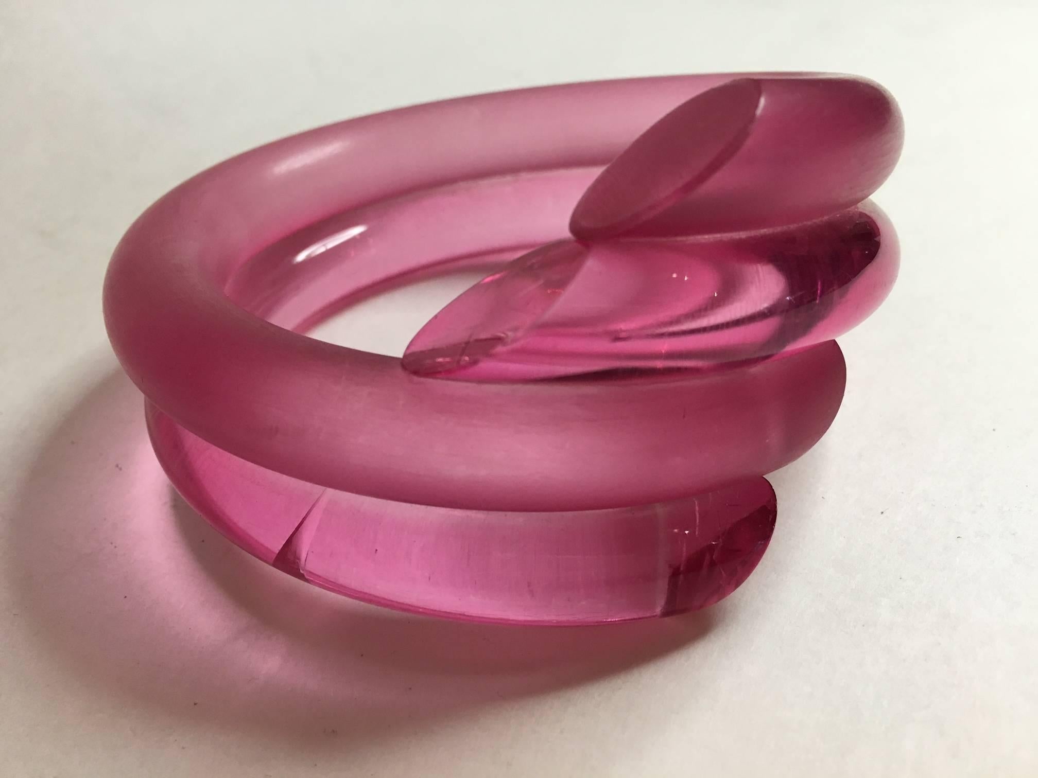 This great pink pink pink! coil bracelet is a combination of clear and frosted matte acrylic tubework. Polished, smooth and liquid on the wrist, it is approximately 2