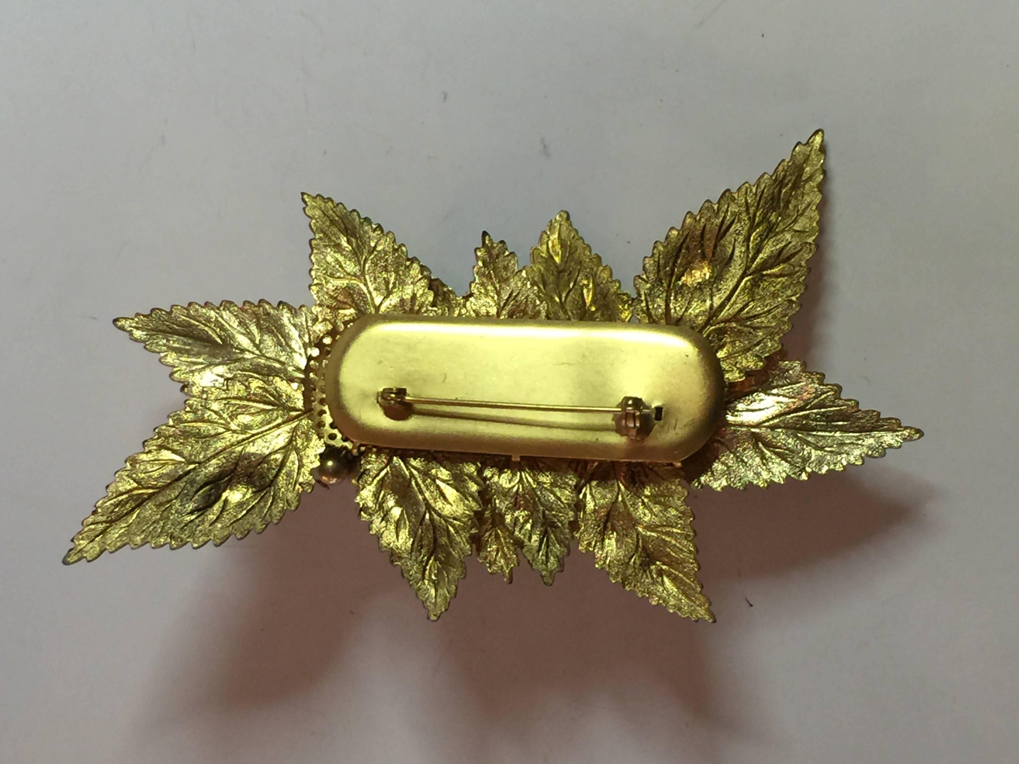 This large 1940s MIRIAM HASKELL Antiqued Goldtone Floral Brooch/ Pin is unsigned, but has all the hallmarks of appropriate very earliest unsigned Haskell jewelry. The matte gold plaque back over the swiss cheese hole anchor conceals all the wirework