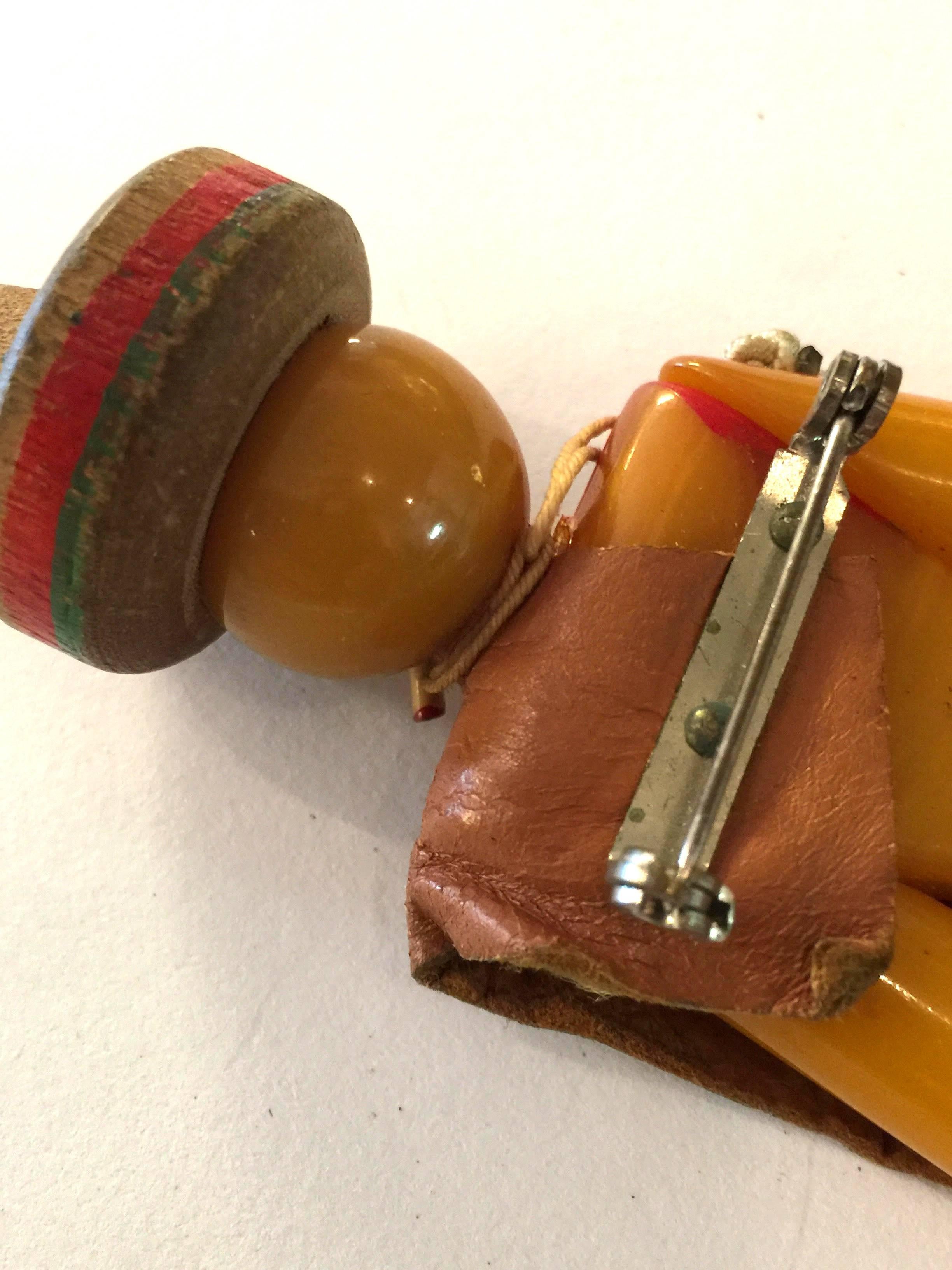 1930s Bakelite Movable Articulated Figural Mexican Man Smoking Brooch Pin In Excellent Condition For Sale In Palm Springs, CA