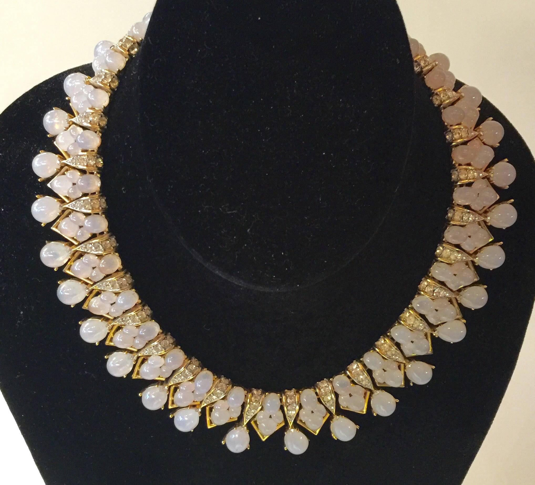 This amazing TRIFARI 1960s Faux Moonstone and Diamante statement necklace is a work of a master jeweler's art. Created in the late 1950s and immeasurably beautiful, it was designed by Alfred Phillipe and is executed at the level of quality and
