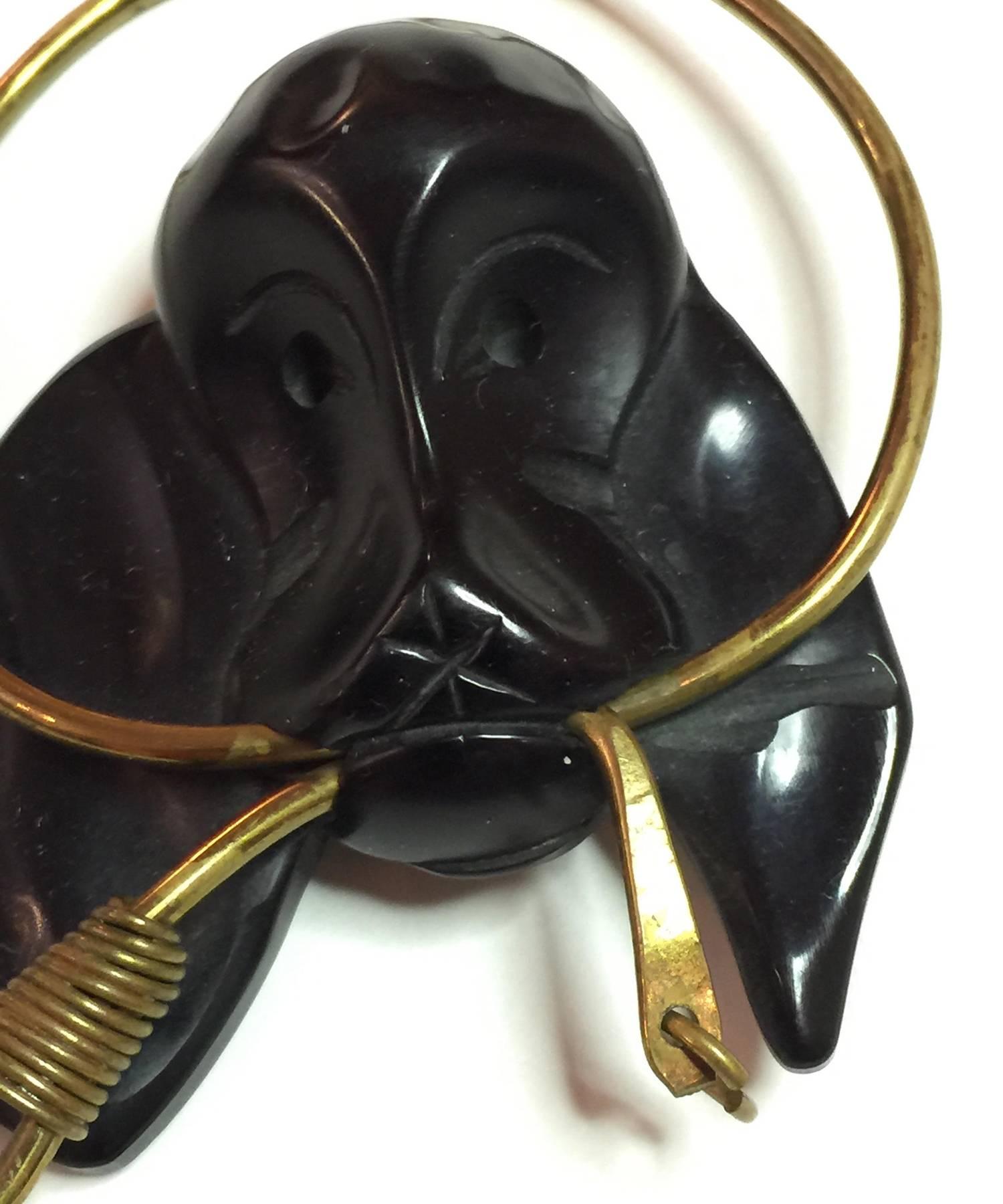 1930s Figural Black Bakelite Dog with Brass Leash in Mouth Brooch Pin In Excellent Condition For Sale In Palm Springs, CA