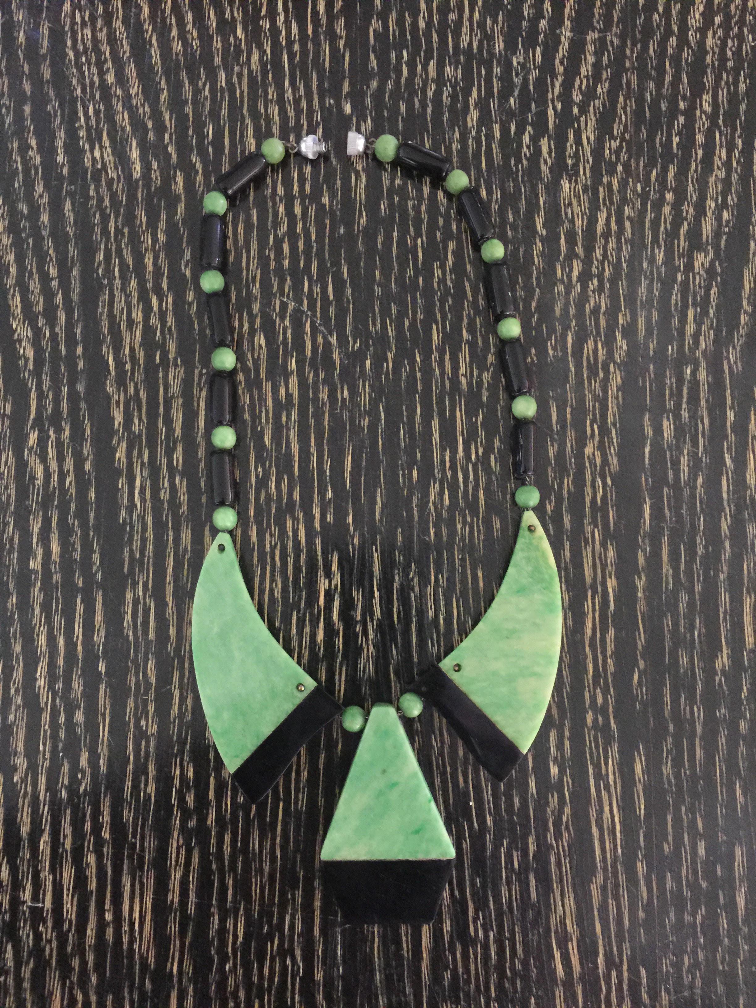 Exotic and luxuriant, this Green and Black Galalith and Faux Shagreen European Art Deco 1930s Necklace is most definitely Art Deco in style and most probably French in origin. The combination of black galalith as well as resin in luscious celadon