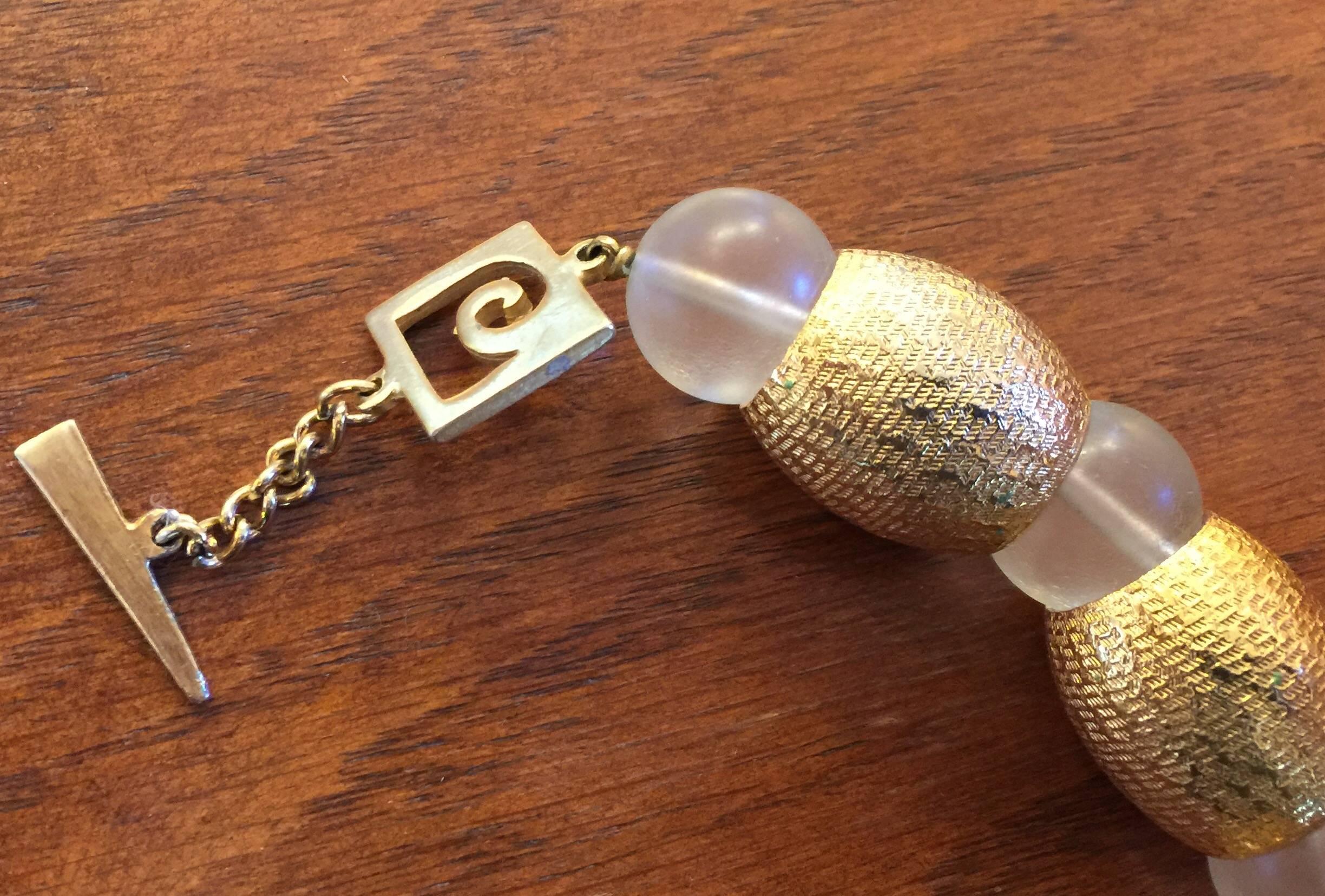 Modernist PIERRE CARDIN 1970's Brushed Goldtone and Frosted Acrylic Ball Necklace For Sale