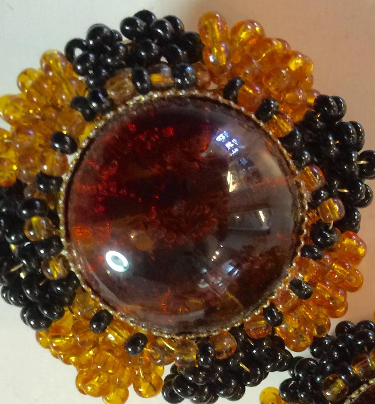 1970s William deLillo Faux Amber and Jet Seed Bead Clip on Earrings 1