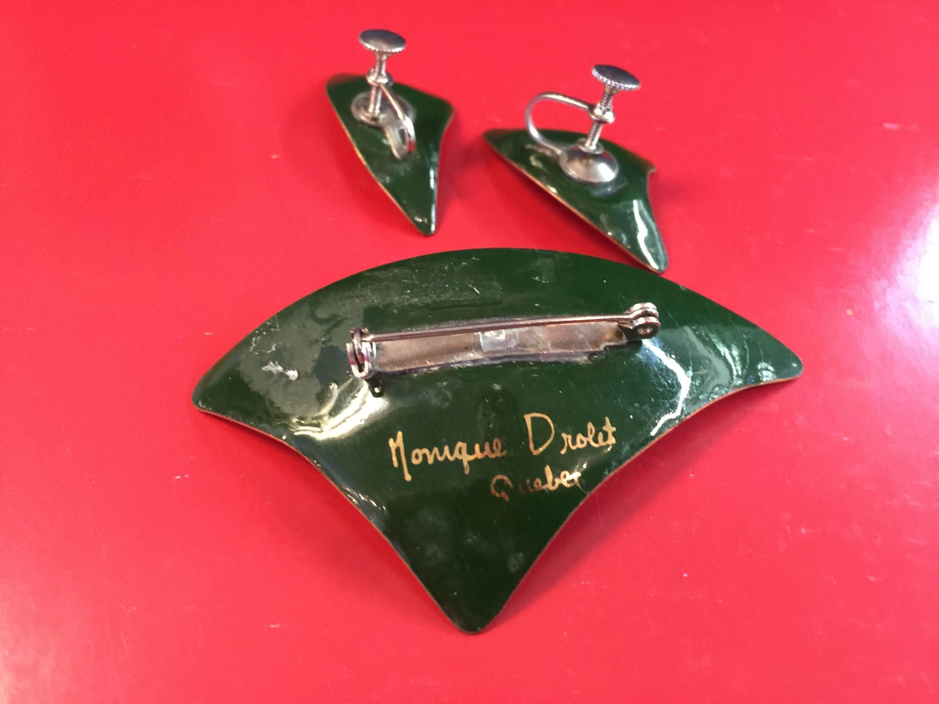 This MONIQUE DROLET Modernist Boomerang Copper and Enameled Brooch Pin and Earrings Set is classically 1950s in tone, material and execution. Part of the Modernist tradition in Quebec in the 1950's and 1960's, this particular artist demonstrates a