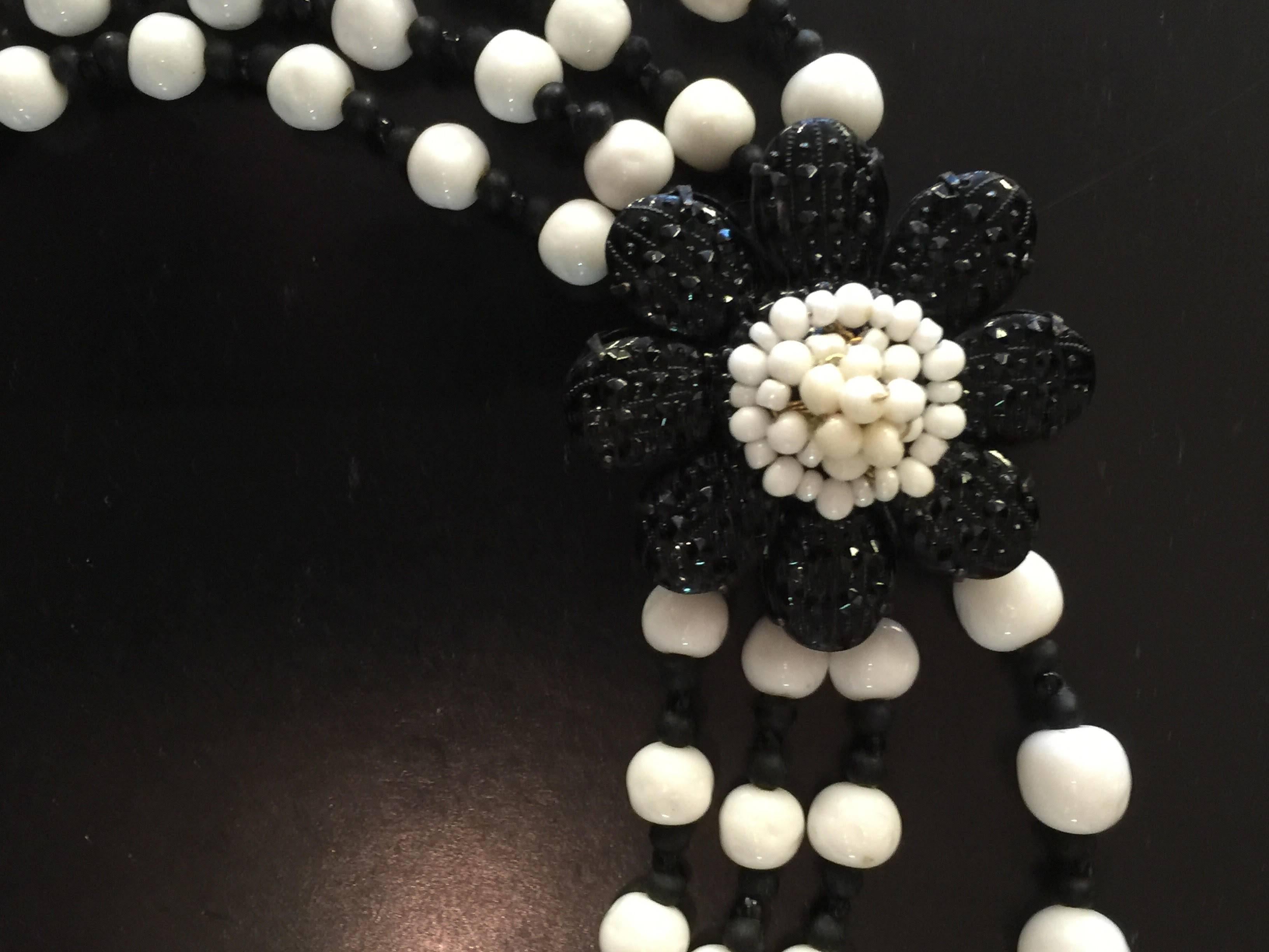 MIRIAM HASKELL 4 Strand Milk White Glass Black Bead Florette Detailed Necklace In Excellent Condition In Palm Springs, CA