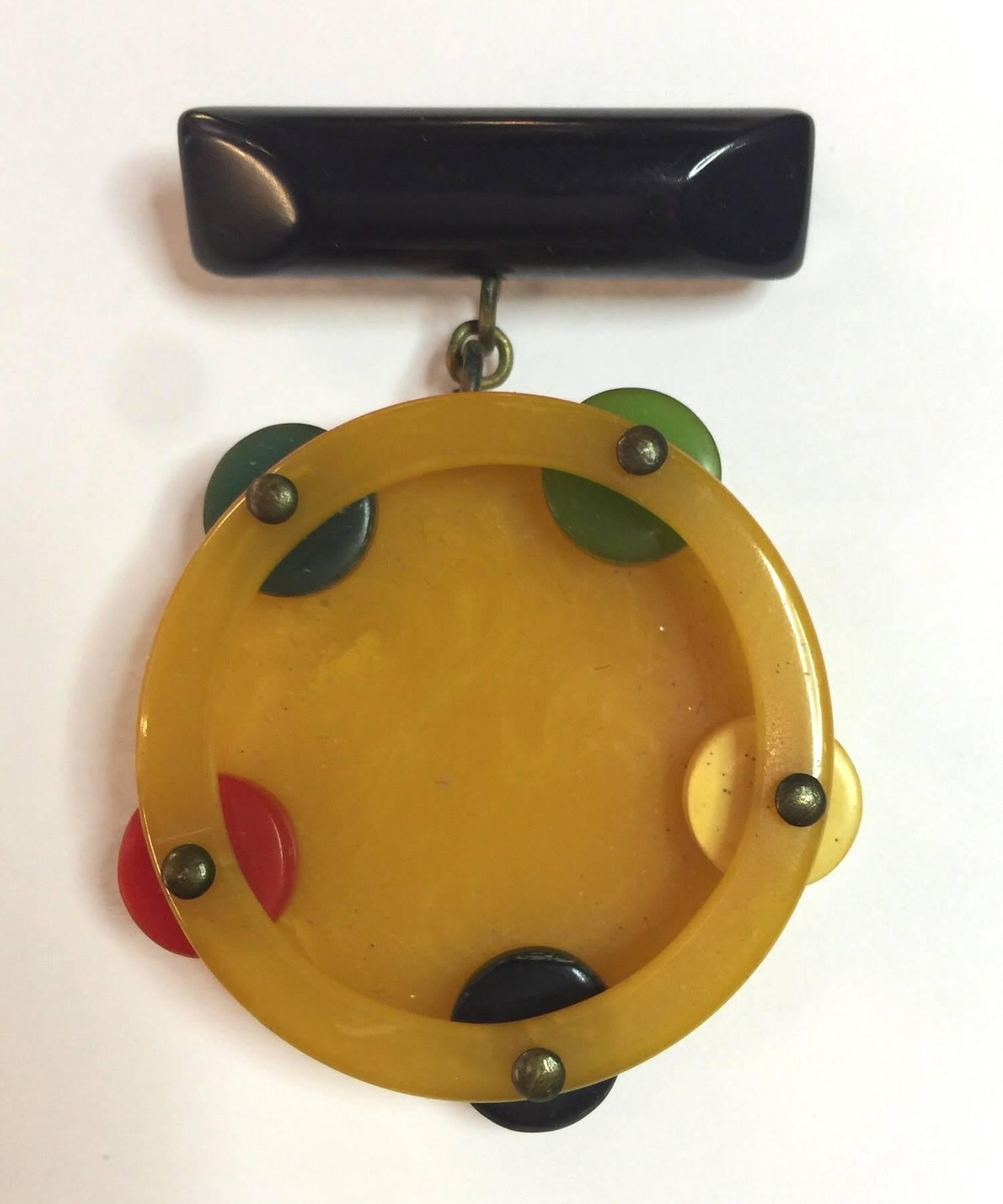 1930s Multicolored Bakelite Figural Tambourine Dangling from Bar Brooch Pin For Sale 2
