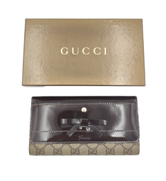 Gucci monogram brown patent leather bow continental wallet