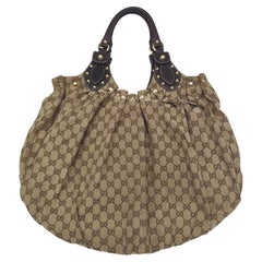 Gucci brown monogram studded large shoulder bag