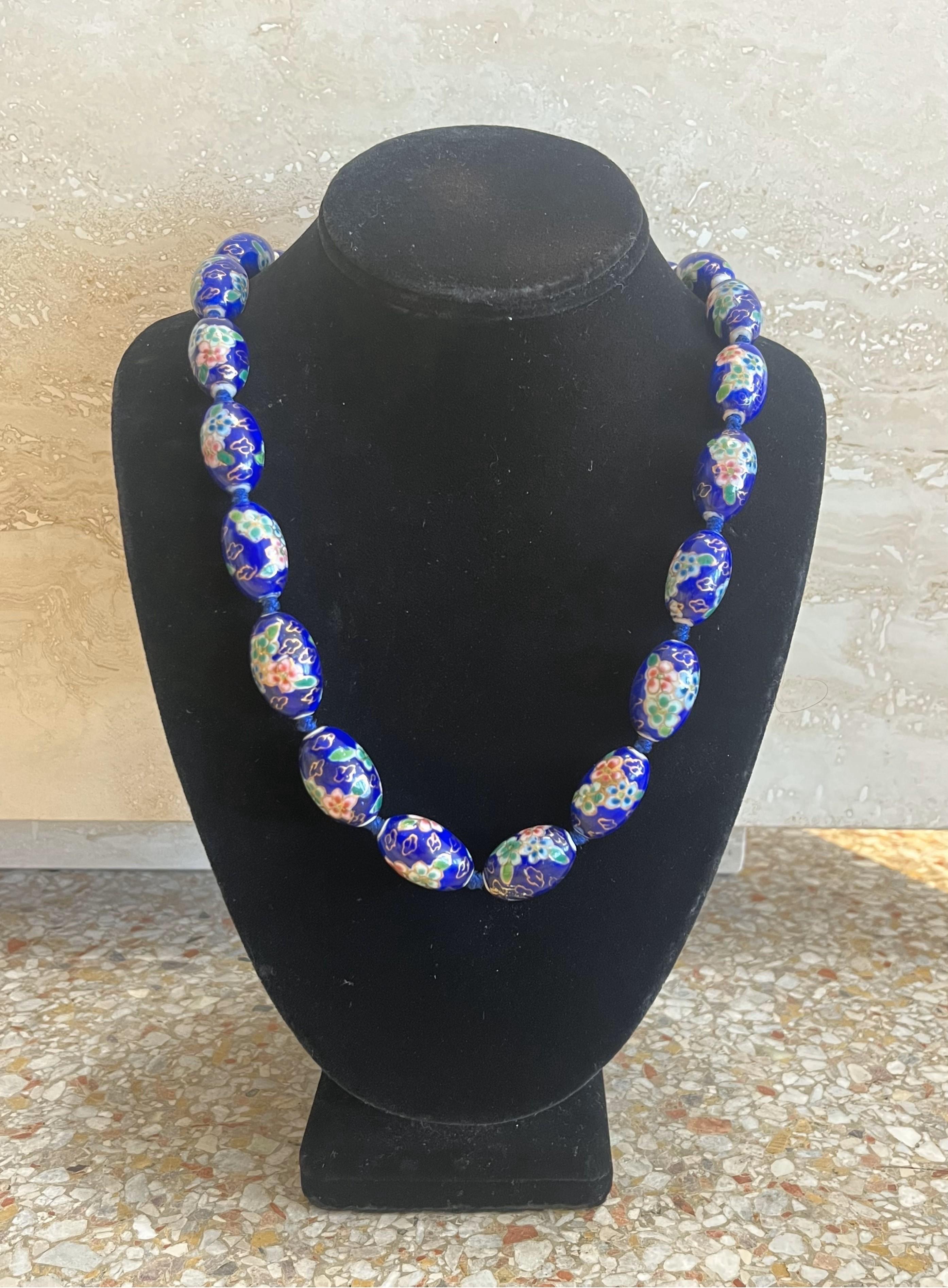 This Vintage Chinese Blue Porcelain Necklace is a unique and elegant piece of jewelry that showcases the beauty of traditional Chinese porcelain artistry.

This is the most common style for this type of necklace with the classic blue-and-white