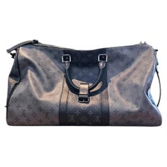 Louis Vuitton Keepall Bandouliere 50 LV Monogram Reverse Eclipse Coated Canvas