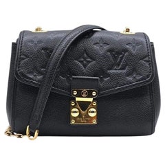 Borsa a tracolla Louis Vuitton Saint Germain BB in pelle Monogram Empreinte, nera