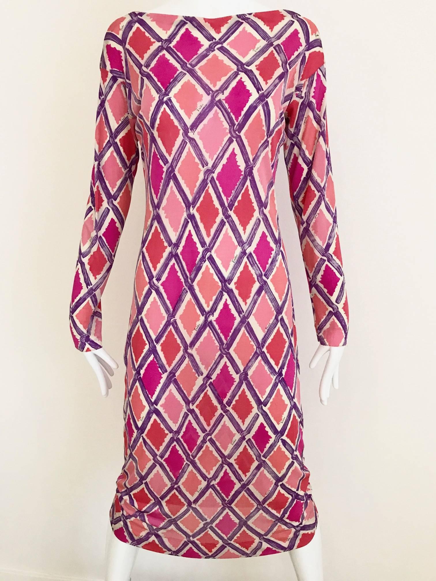 Vintage 1960s PUCCI Geometric Diamond Shape Print soft silk Jersey Dress vibrant fuschia, pink, purple and coral. Slip on Dress ( no zipper) 
Fit Size: 2/4 Small - Medium
Bust: 32 inch to 36 inch. / Hip: 36 inch
*** small fabric has been cut inside